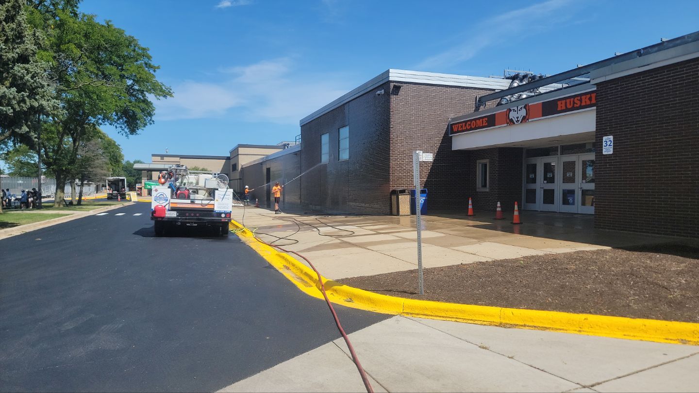 commercial pressure washing using Algaecide, soft wash soap by Northern Power Washing LLC.