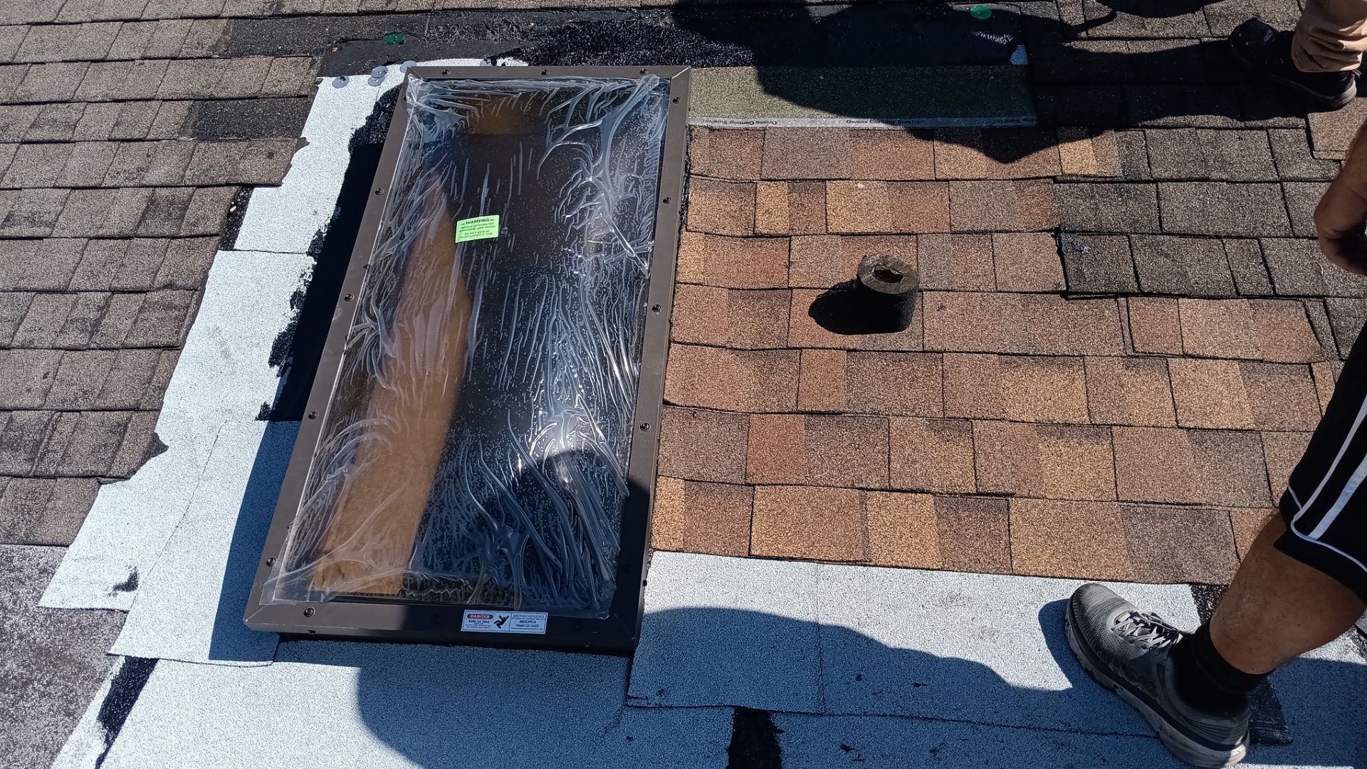 REPLACE NON APPROVED SKYLIGHT ALONG WITH CLOGED GUTTER by Morton Roofing, Inc.