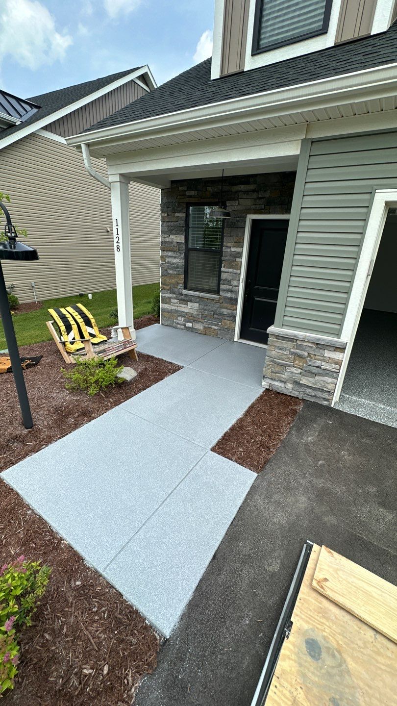 Porch + Garage Project in Evans City by Floors in a Day, Inc