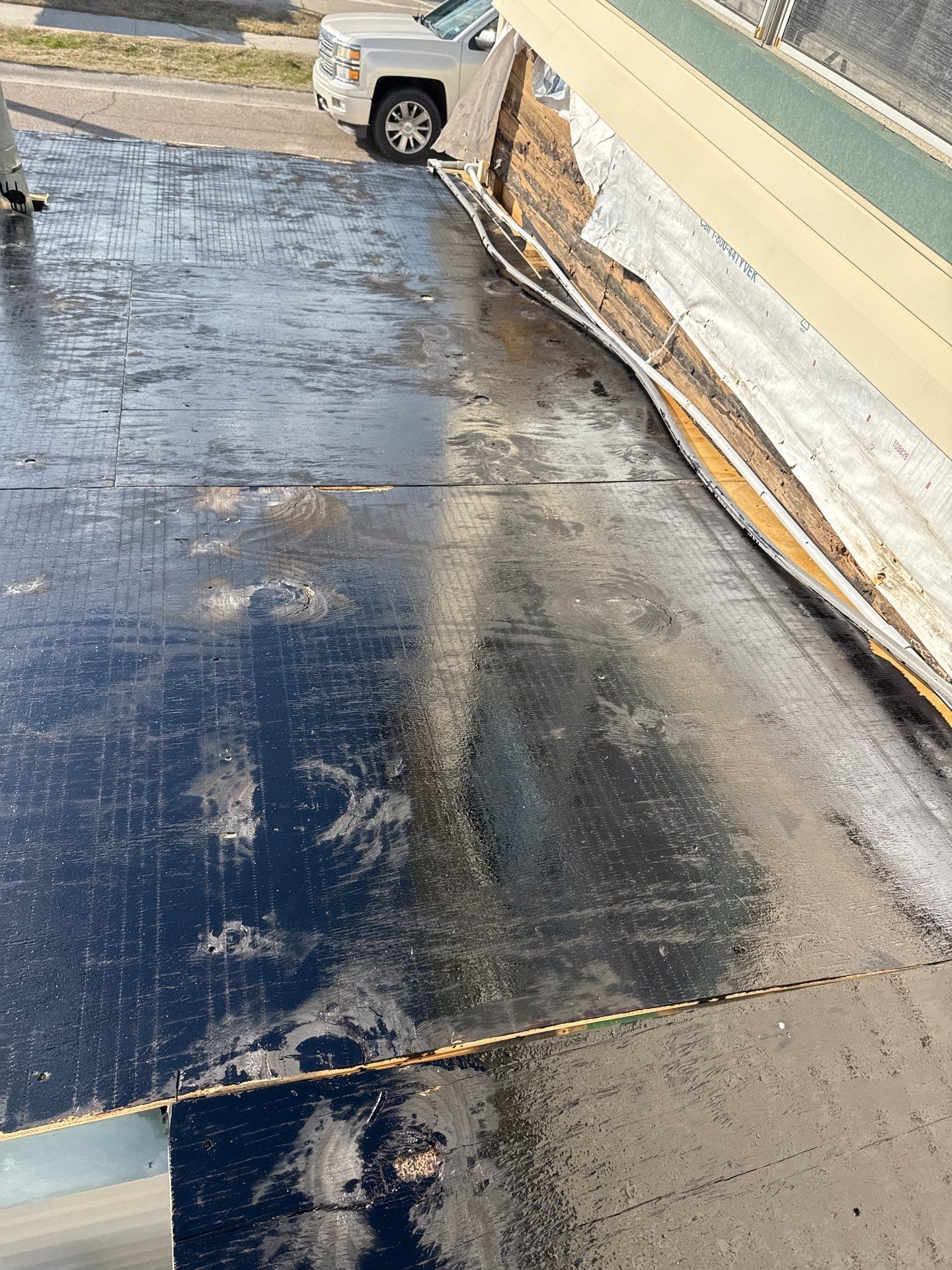 Mustang Island Flat Top by Bayfront Roofing and Construction