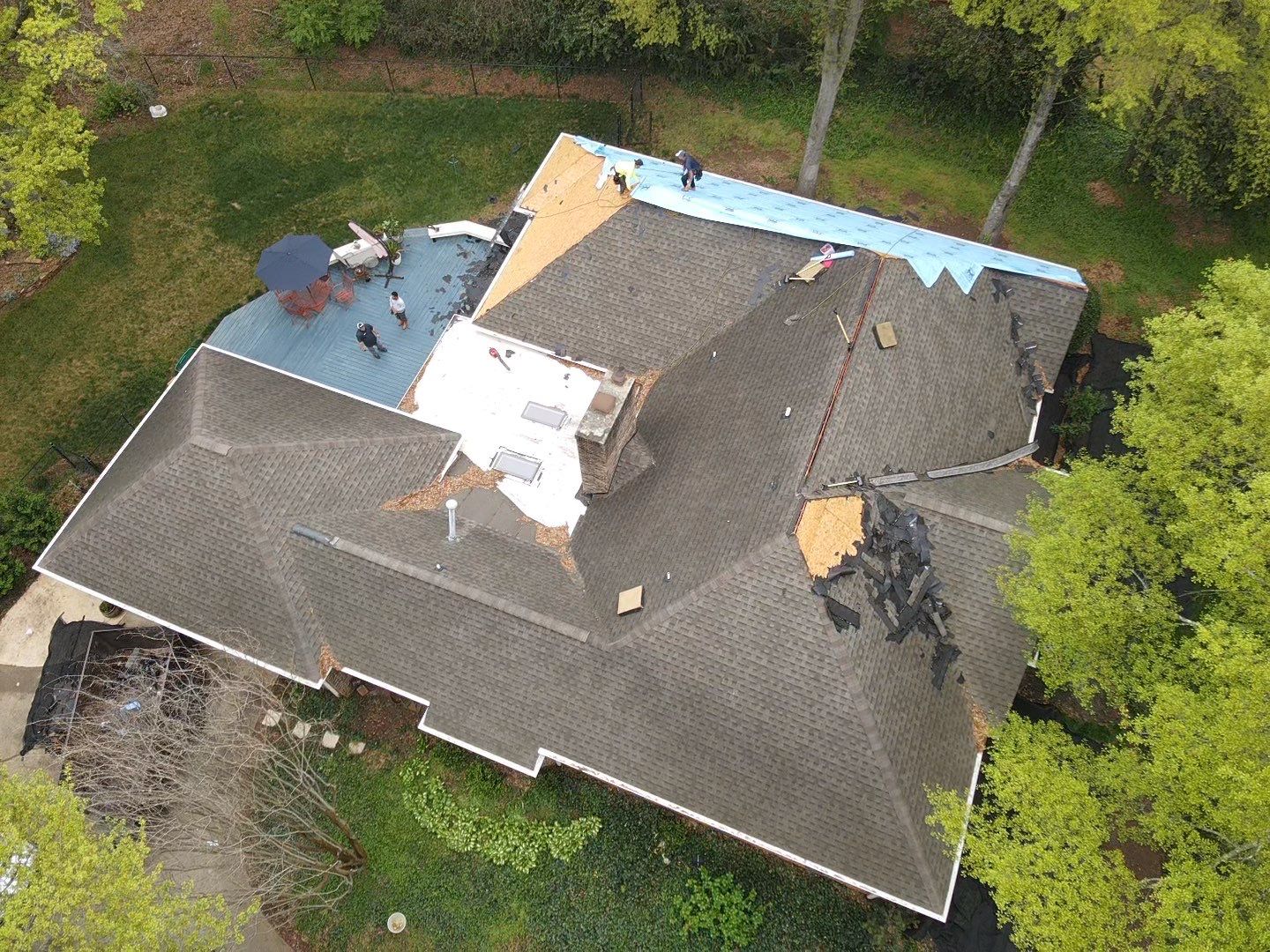 Spartanburg Residential Roof Replacement with Architectural Shingles and Skylights by Roofers LLC