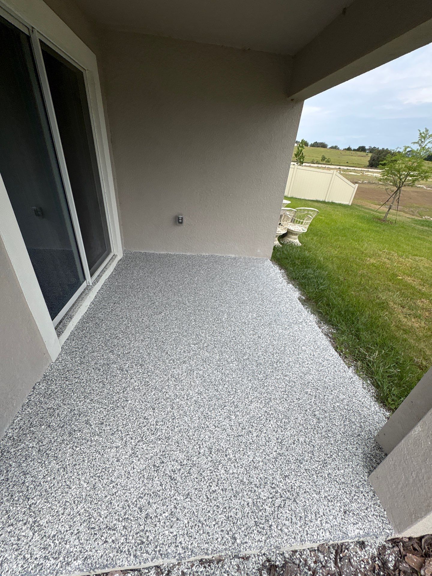 Zephyrhills, FL Epoxy Garage and Patio Floor Upgrade by Performance Floors & Coating