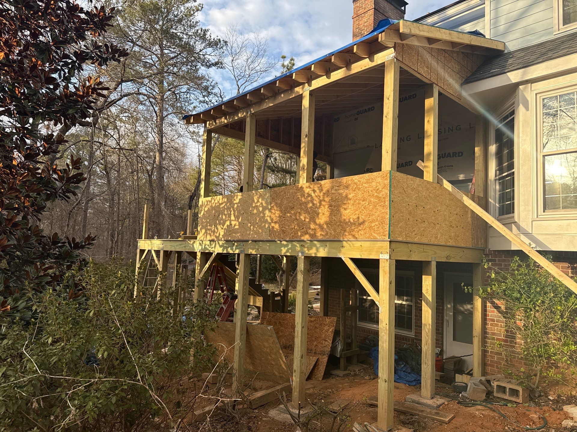 New deck with screened in porch by Nelson Exteriors 