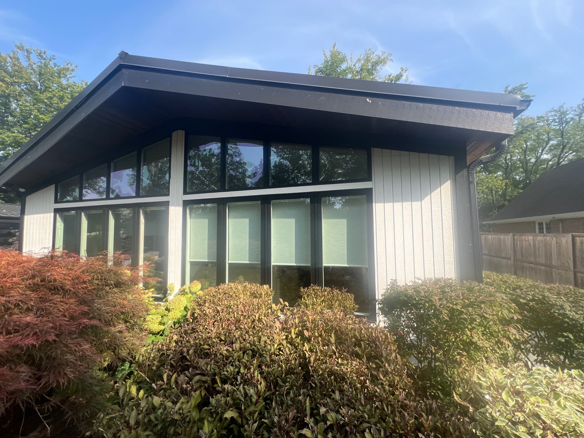 Complete Exterior House, Bluestone & Garage Floor Cleaning by Northern Power Washing LLC.