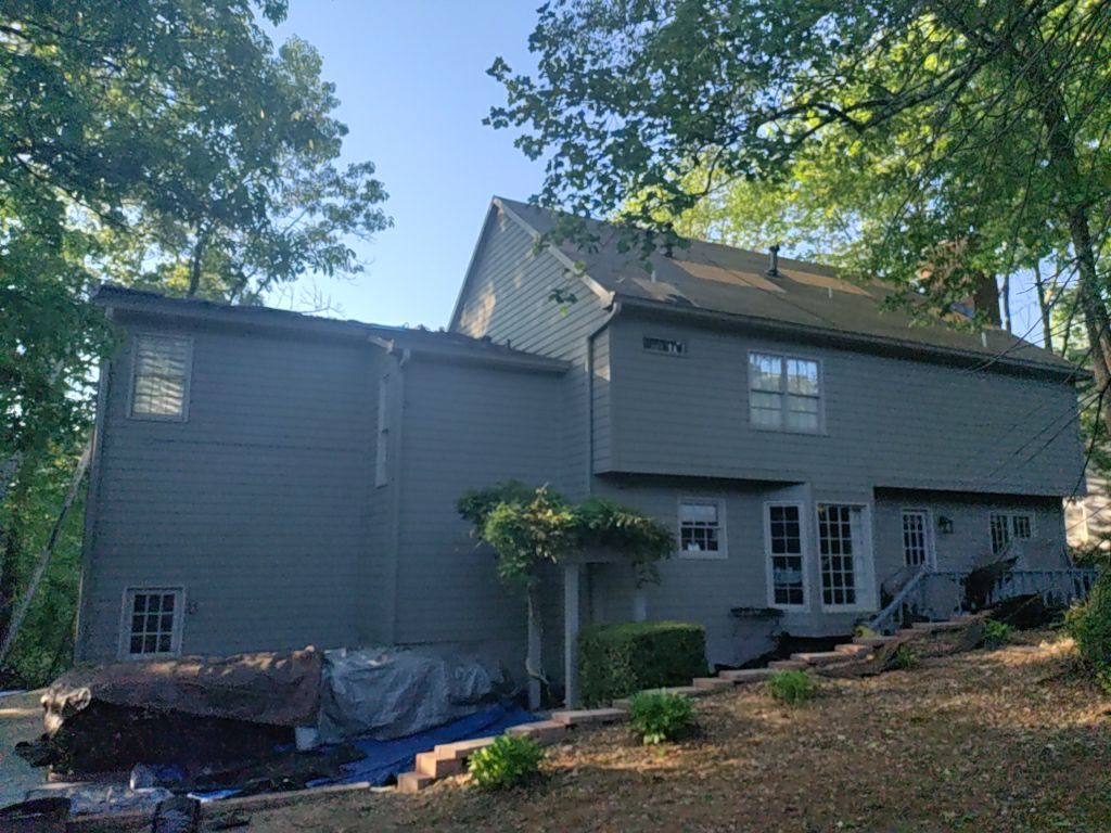 Residential Roofing Installation using Owens Corning Quary Gray by Inspector Roofing and Restoration