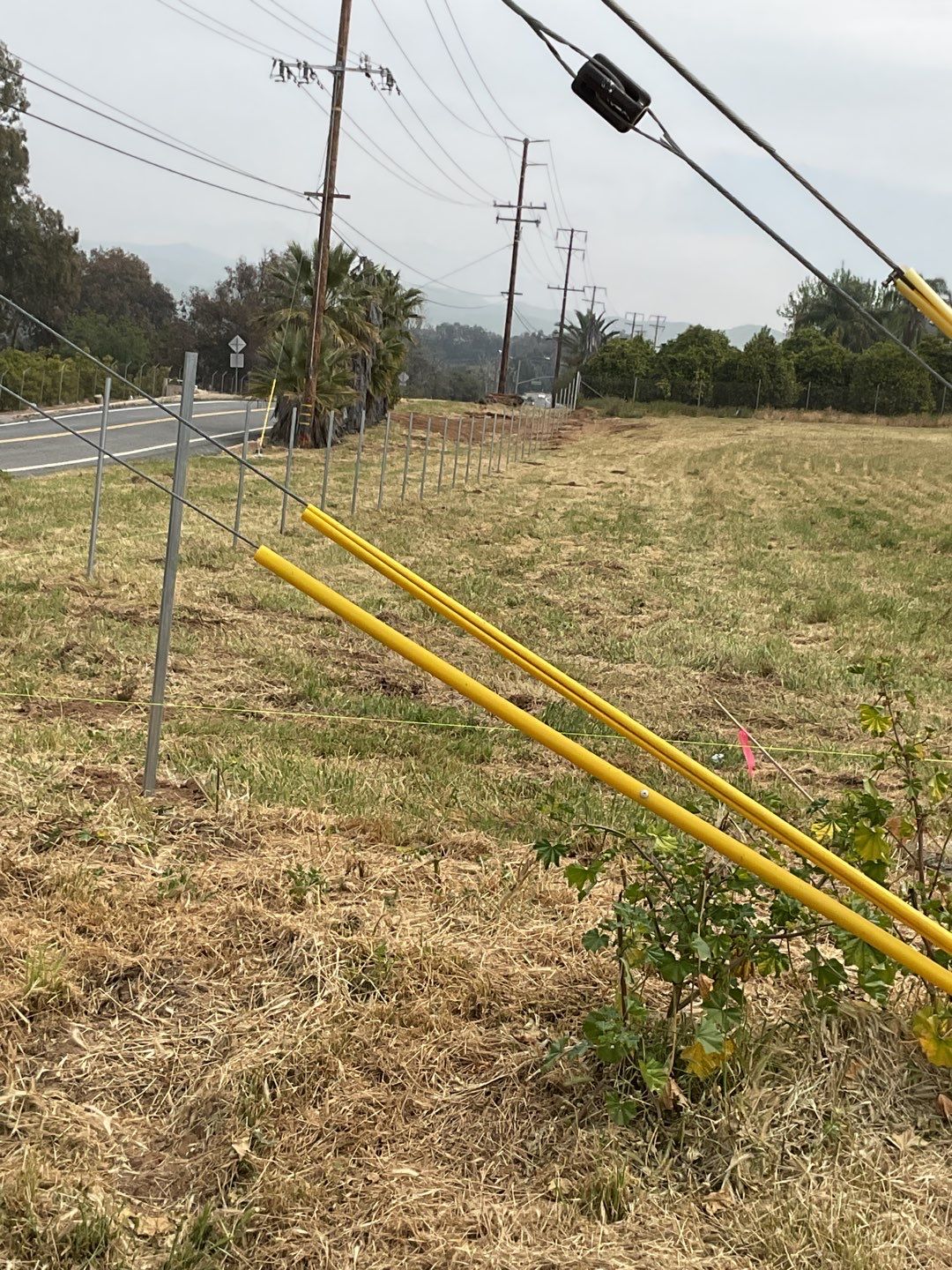 Fence installation using chain link wire by Fence Guys Inc. 