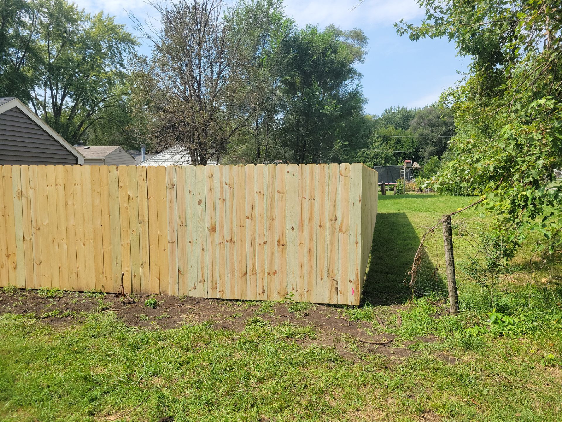 Treated Pine Privacy and Picket Fence Installation in Evansdale by Perfect Picket Fence and Stain