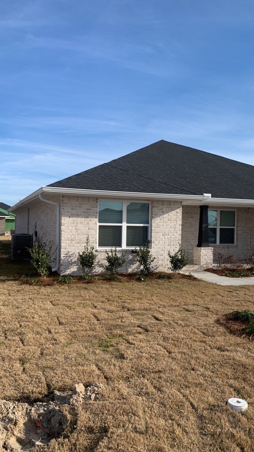 Seamless Gutter Installation Using White K-Style Gutters by Gutter Professors
