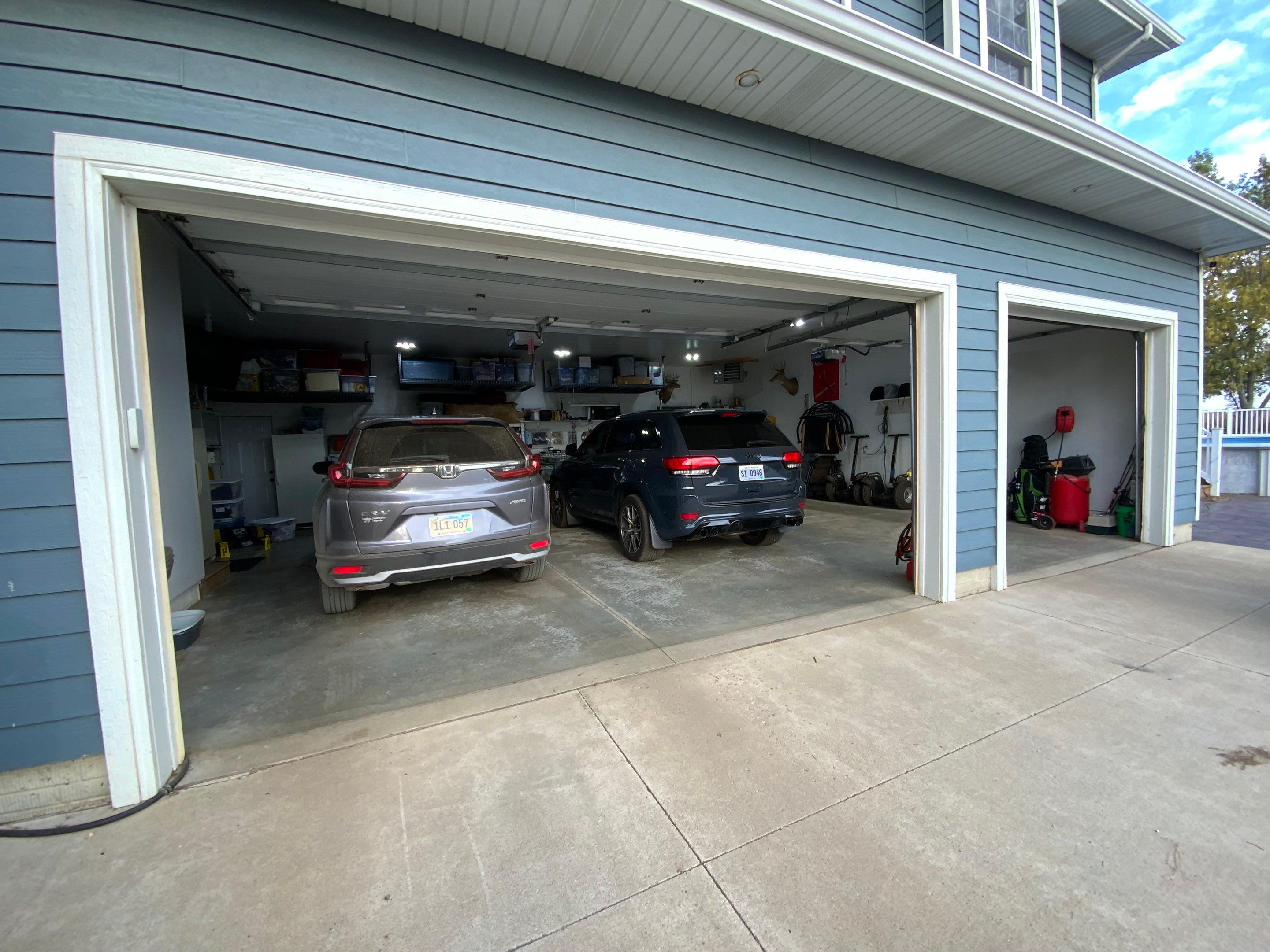 Garage using Silver Creek by Select Painting, Coatings & Garage Cabinets