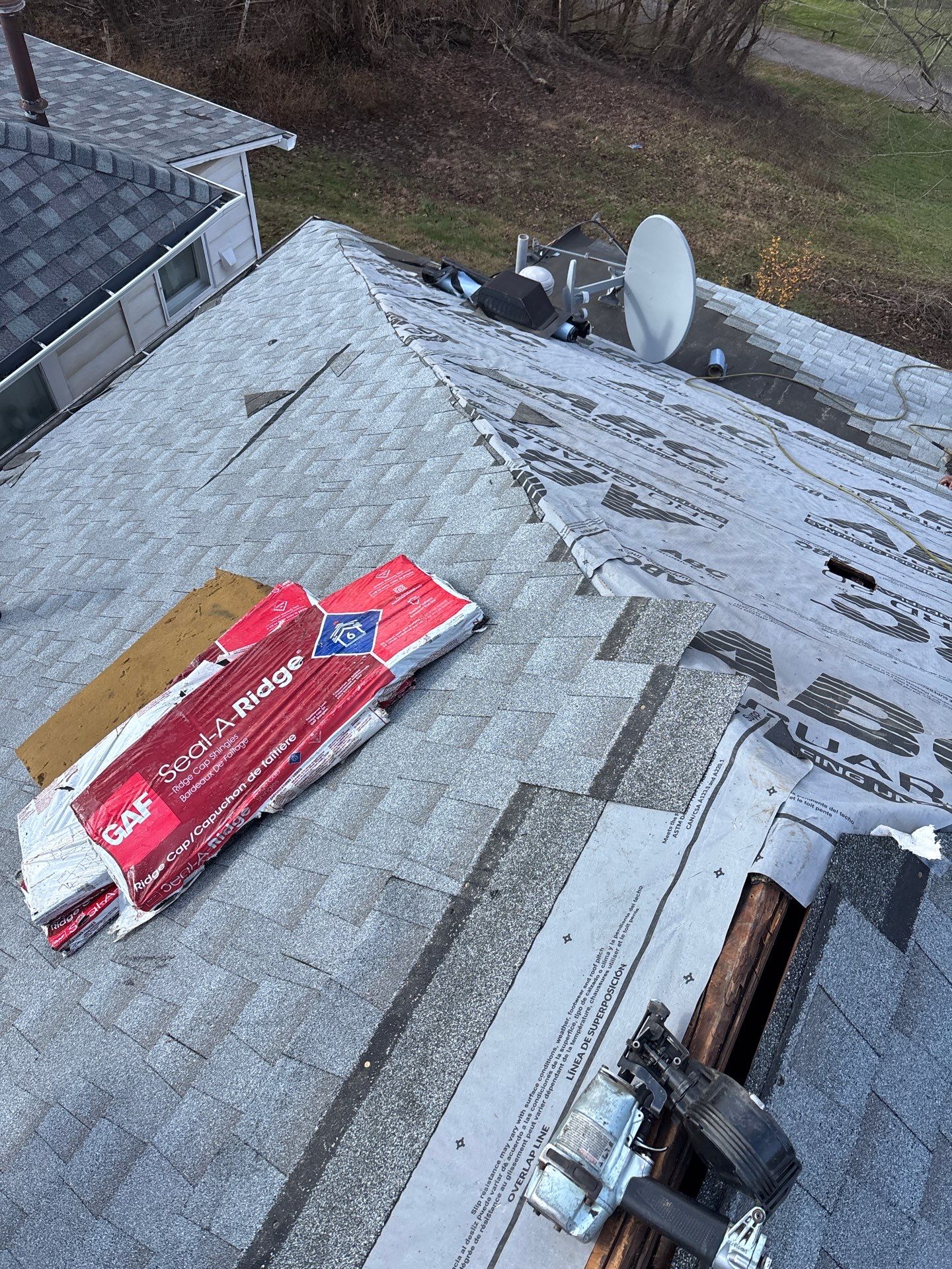 Residential Roofing Installation using GAF Timberline HDZ Charcoal by Rainstoppers Roofing