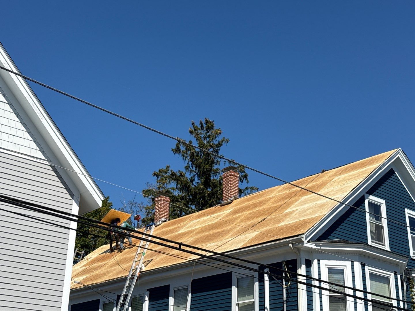 Half Roof Replacement for Solar Installation – Townhouse with New Plywood Decking by Sensible Home Solutions