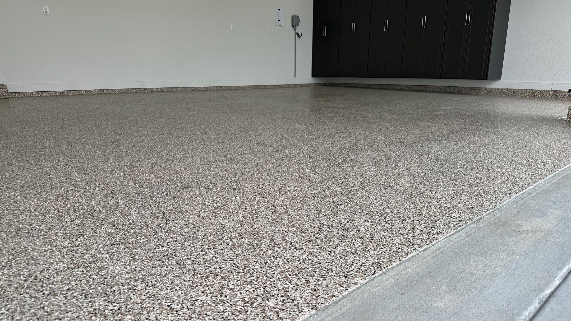Ron B. upgraded his garage with cabinets and a Banner Garage Floor by Banner Garage