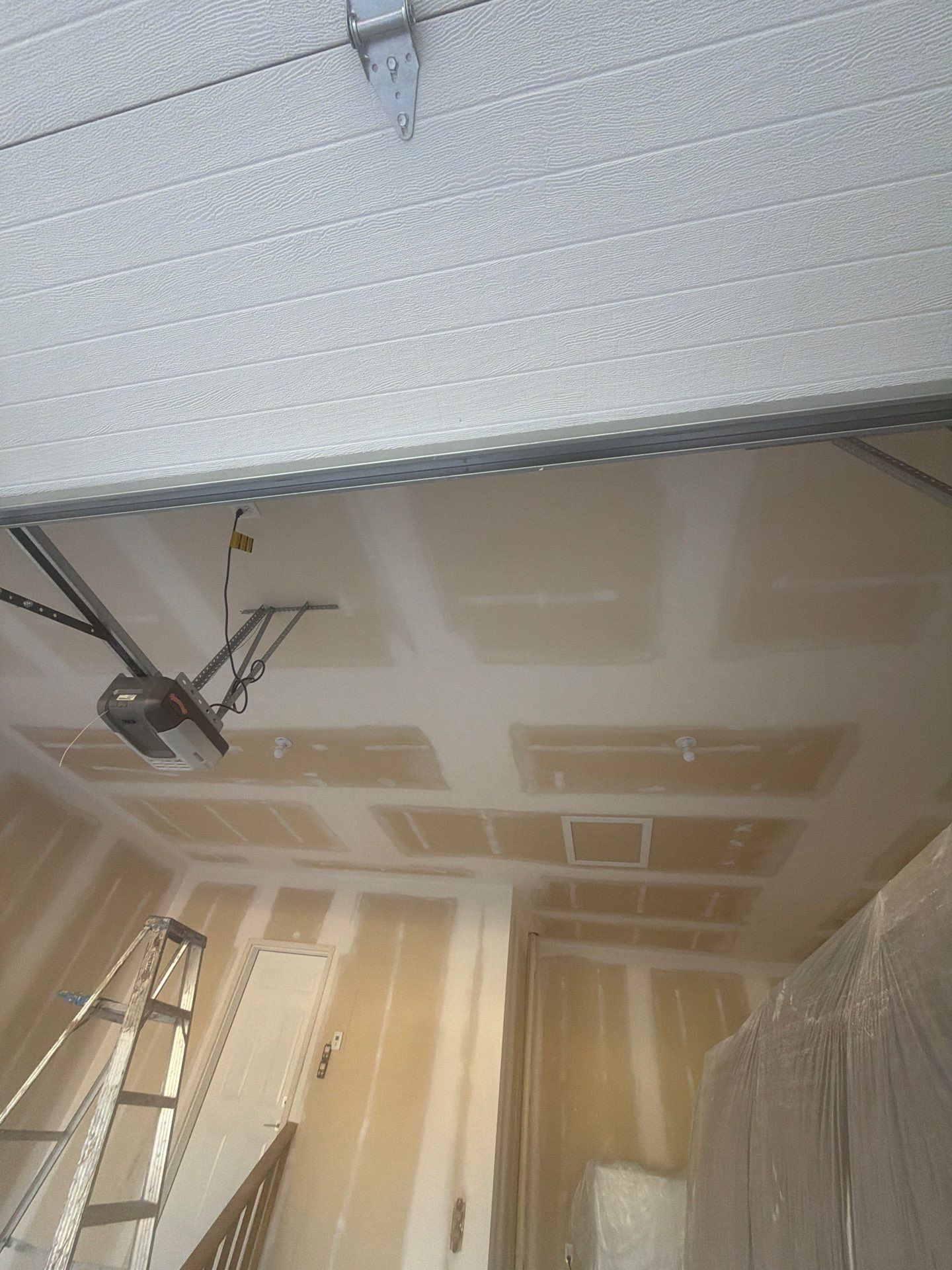 Full Garage Interior Drywall Finishing and Priming in Sioux Falls by Select Painting, Coatings & Garage Cabinets