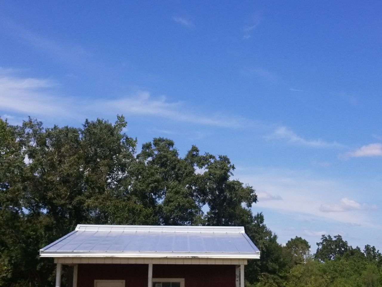 Residential Roofing Installation using Metal roofing by American Roofing & Construction LLC