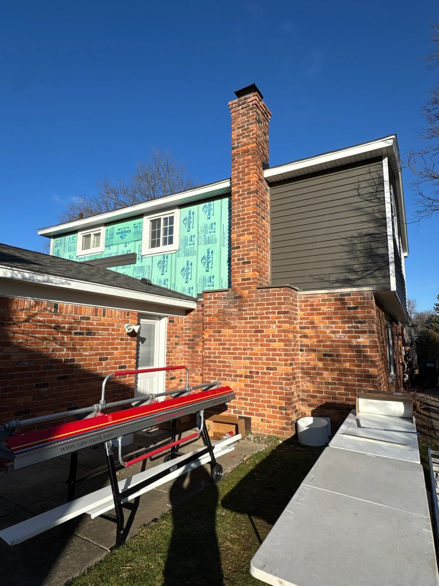 Siding Replacement using Alside Charcoal Smoke and Roof Replacement using Owens Corning Peppercorn by 180 Contractors
