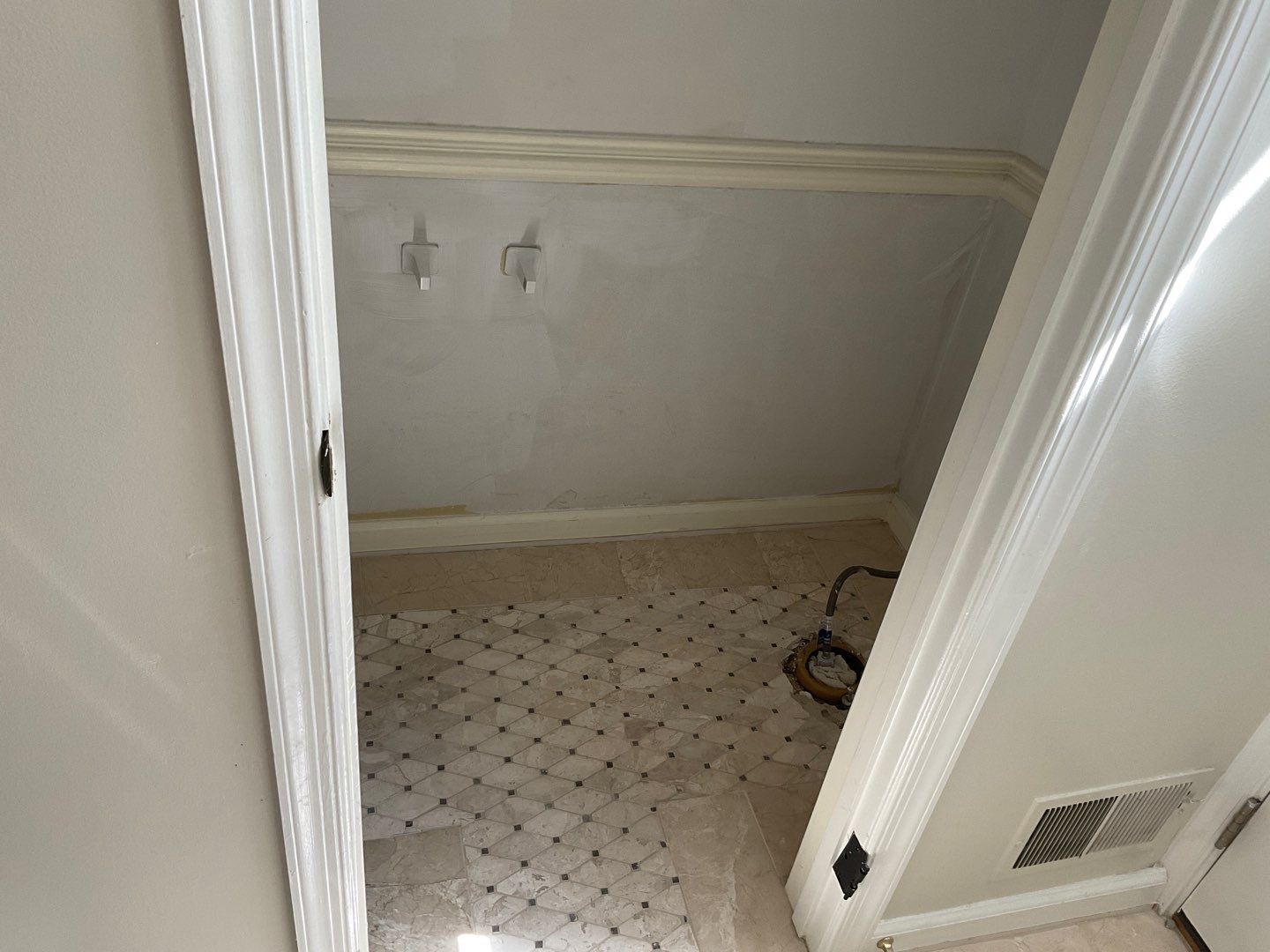 Bathroom Remodel using Two new bathroom design and new floors by Alpha Design Services