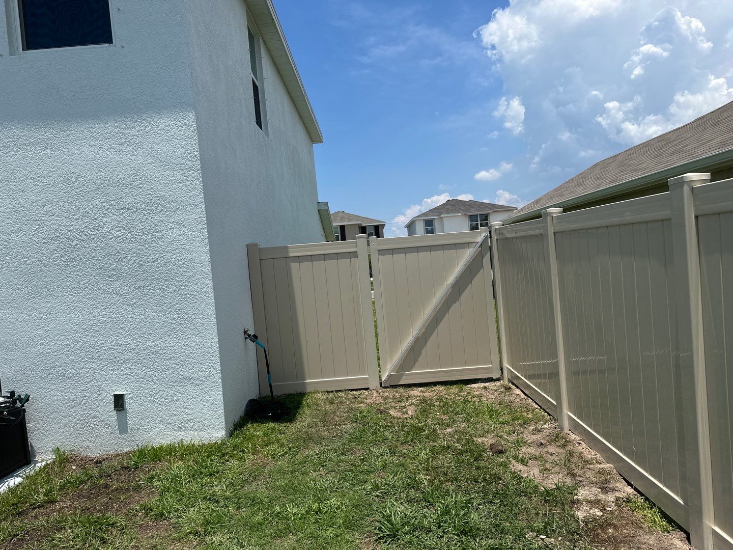 Aluminum Fence Installation using Black 3 Rail Aluminum Fence and Tan Vinyl Privacy Fence by Asap fence and gates, LLC