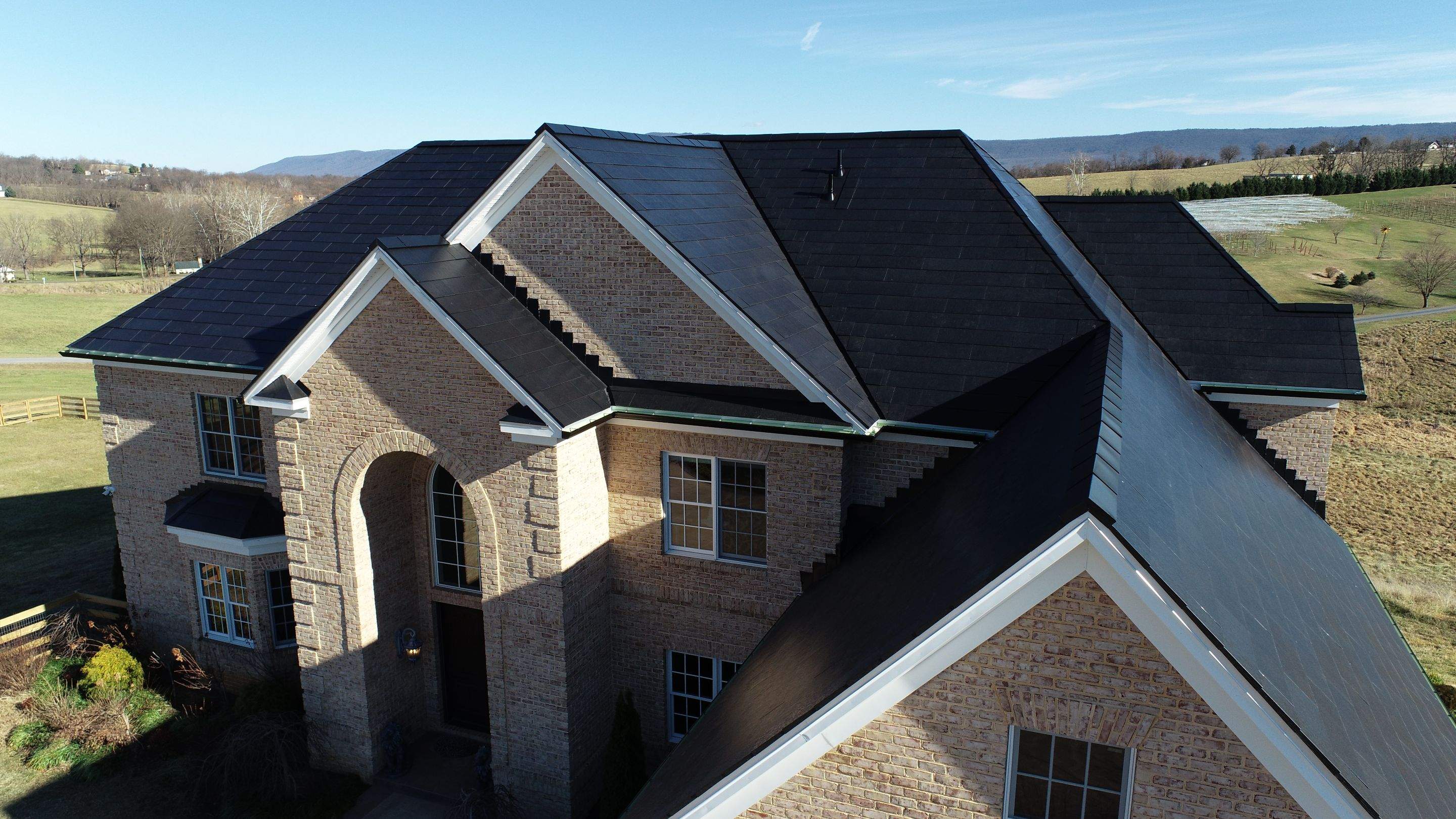 Tesla Solar Roof Replacement by American Home Contractors