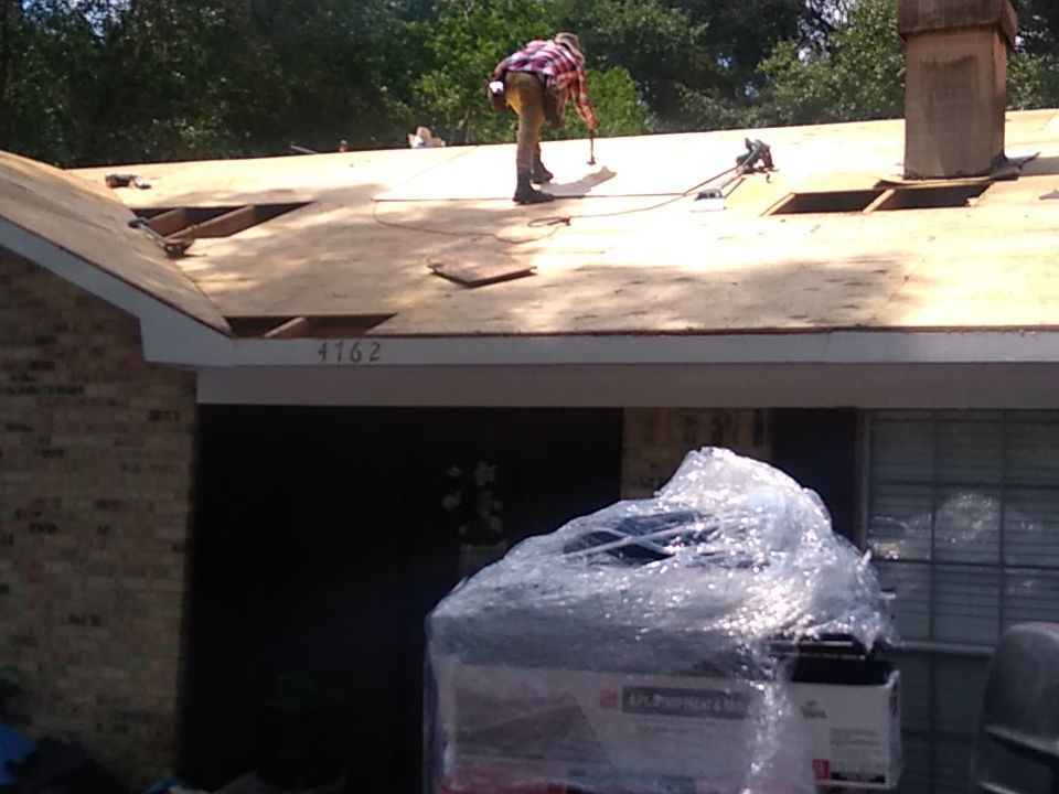 Residential Roofing Installation using Roof Replacement by American Roofing & Construction LLC