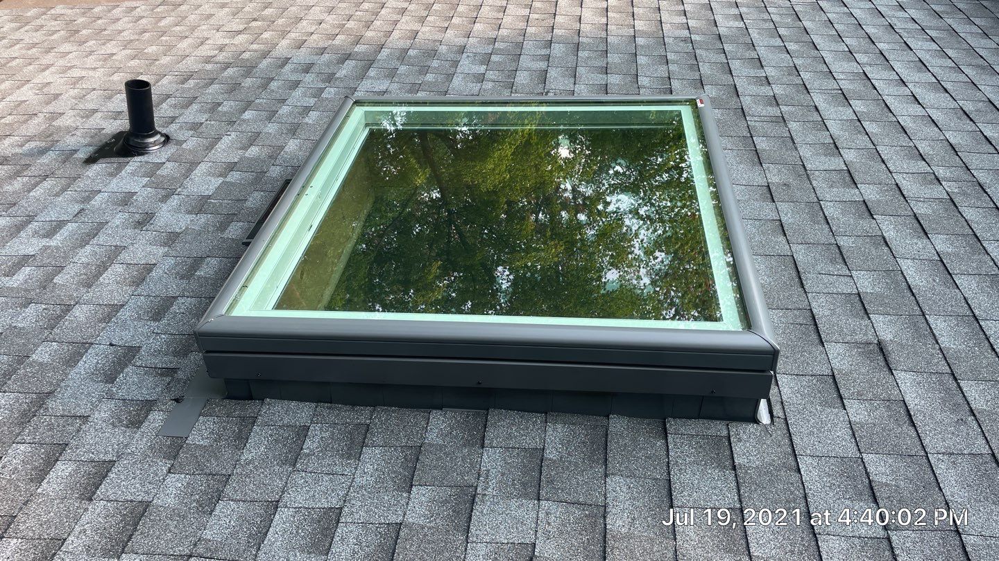 Deckhouse Roof Replacement by American Home Contractors