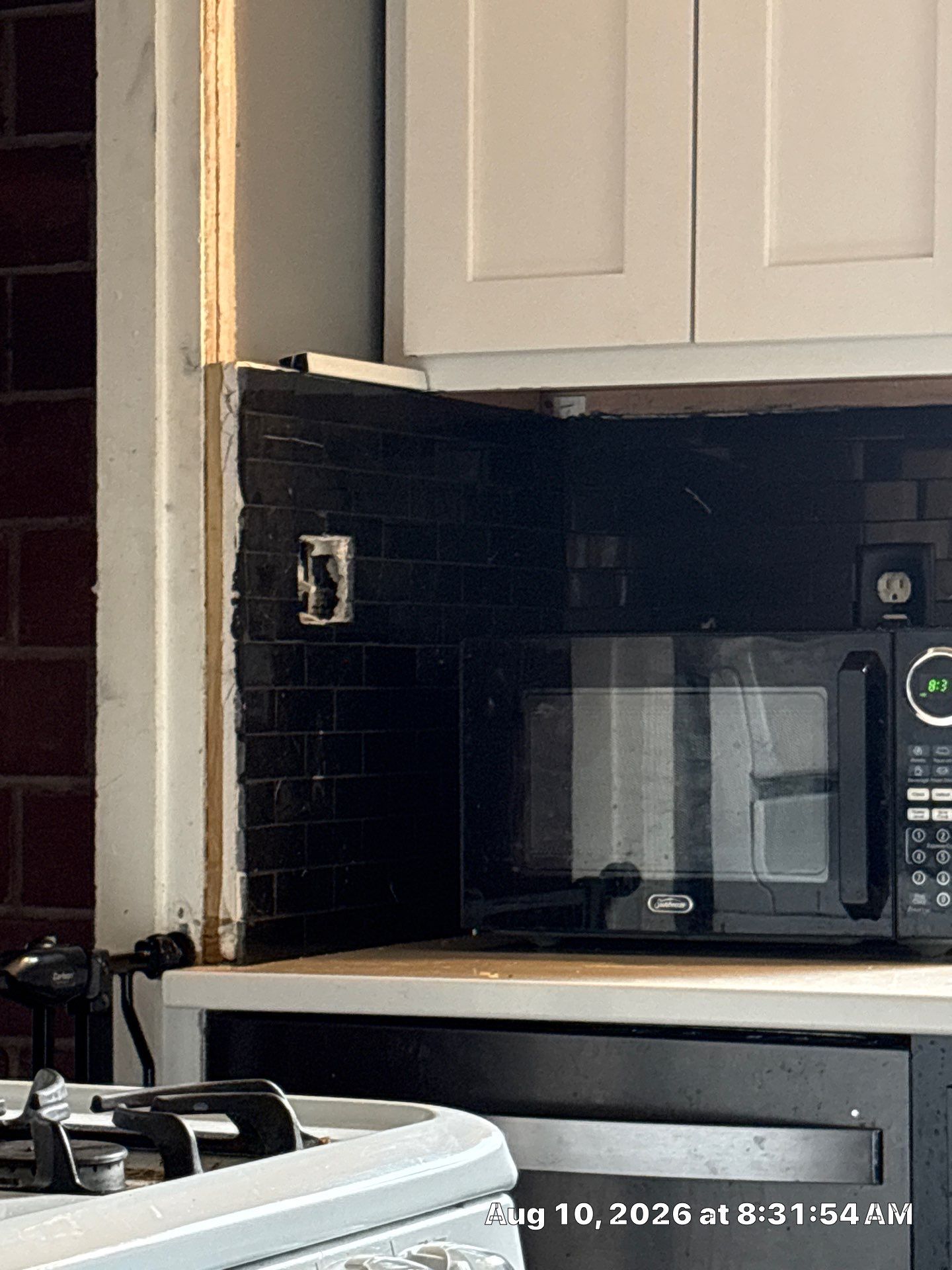 Modern Kitchen Renovation with Black and White Cabinetry in Lincoln by CompanyCam Sales Demo