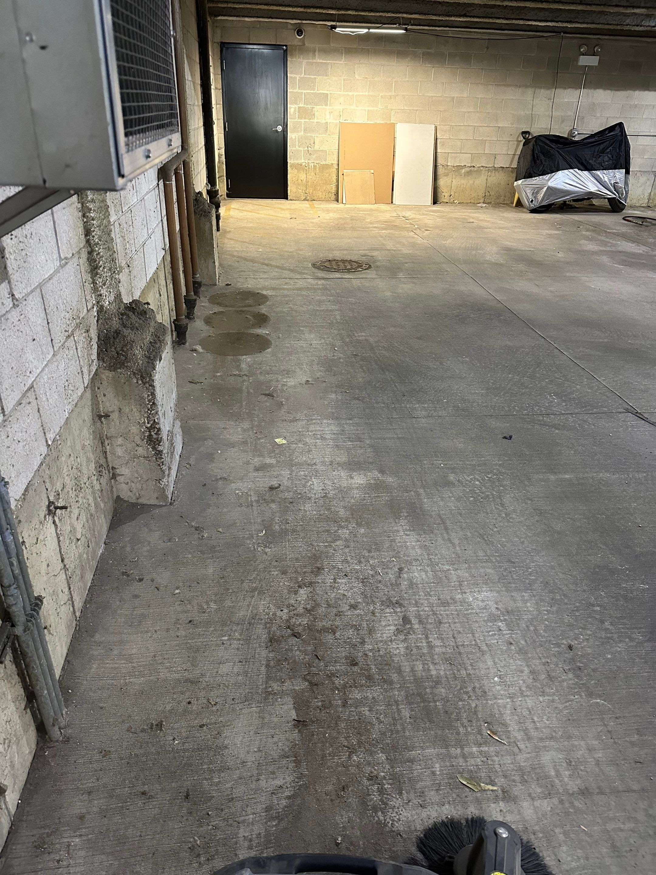 Parking garage cleaning using Hot water by Northern Power Washing LLC.