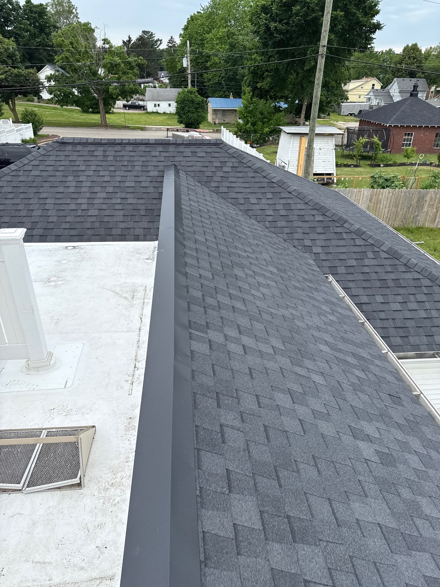 Commercial Flat and Shingled Roof Project by 42 North Construction, LLC.
