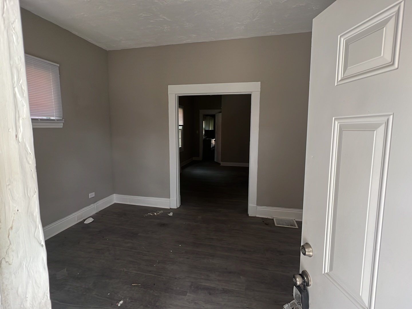 Rental Property Restoration, siding, flooring, gutters, landscaping by Storm Contracting 