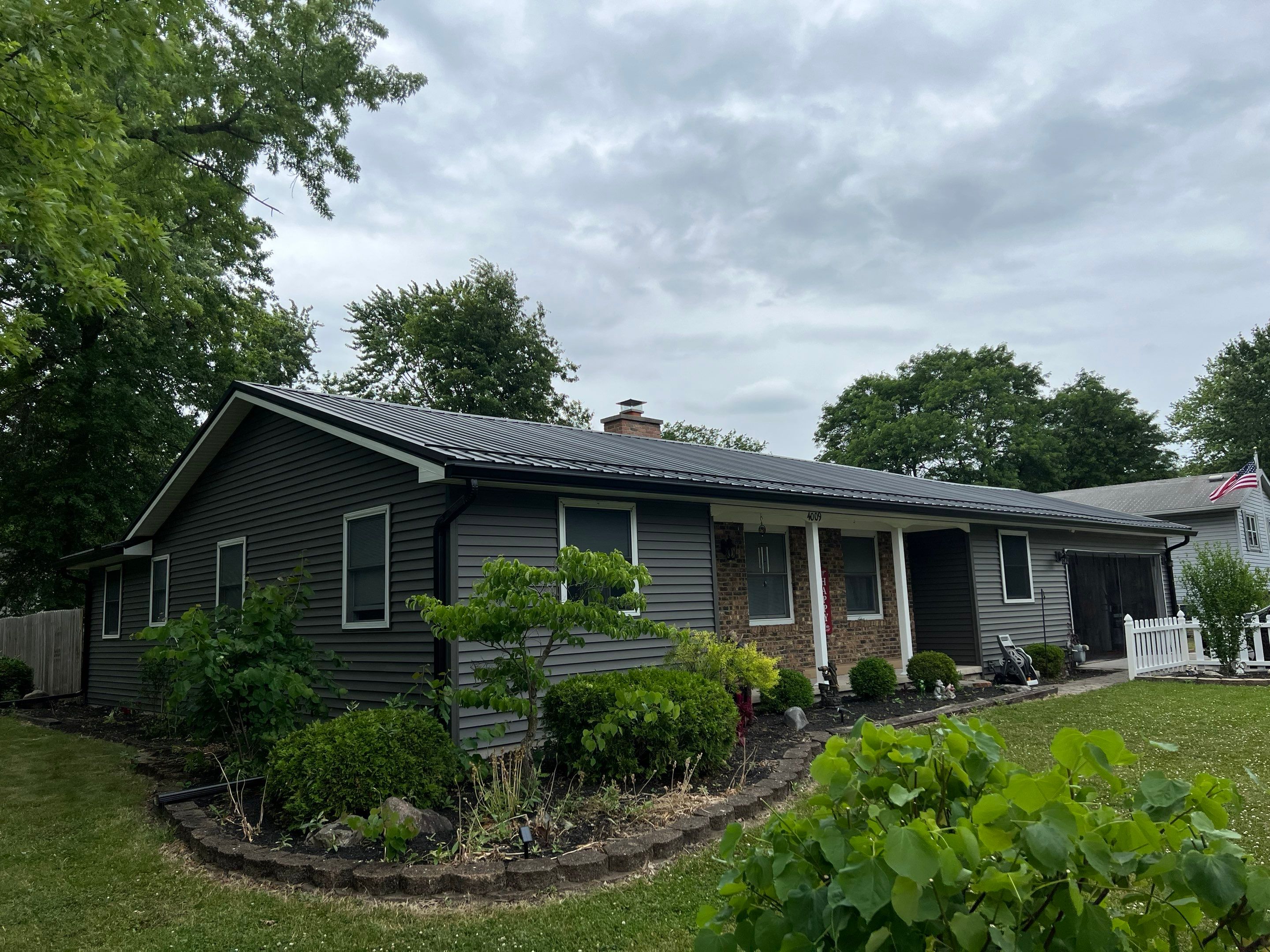 Complete Exterior Transformation - Exposed Fastener Roofing System by 4Ever Metal Roofing