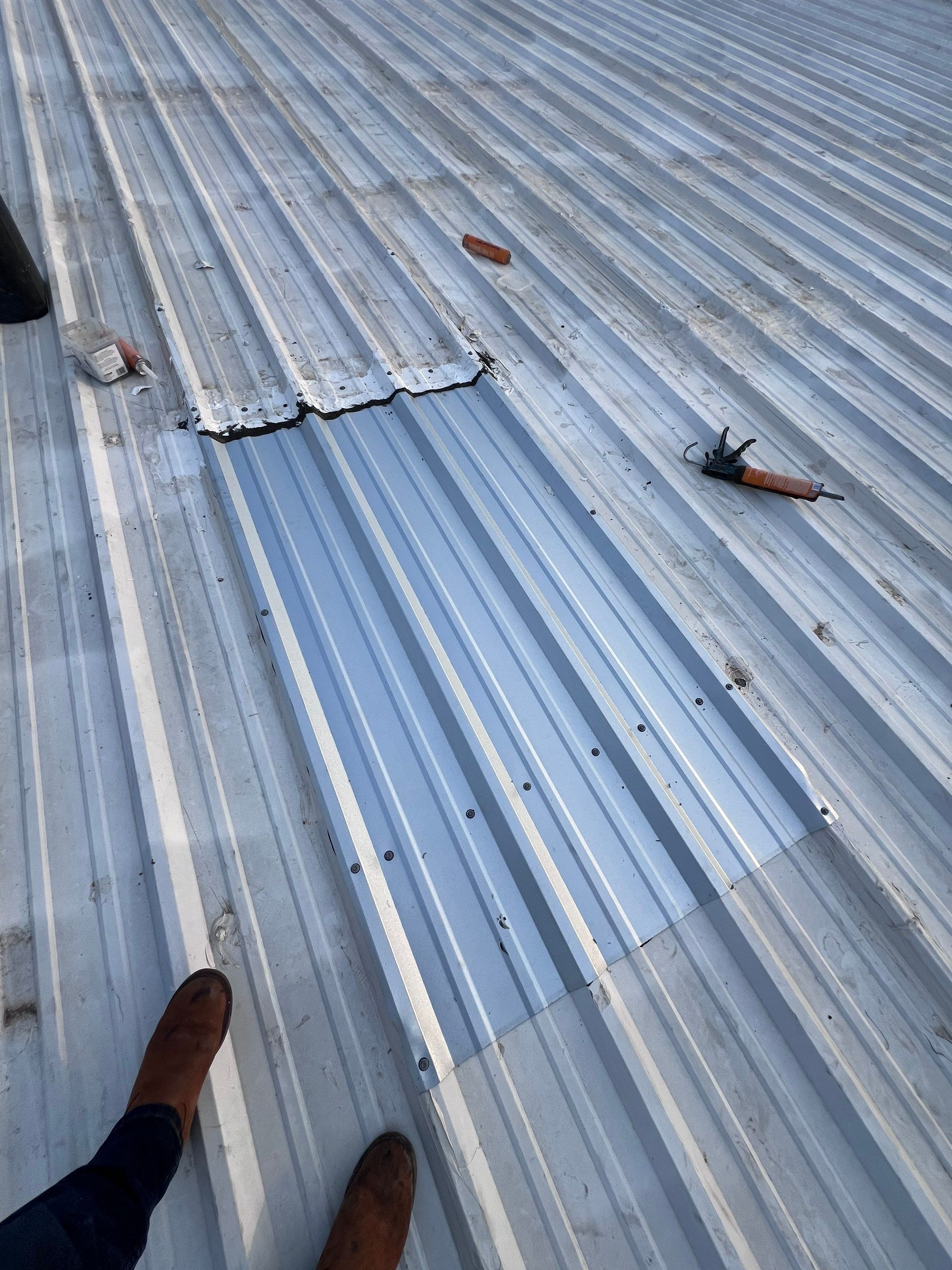 Commercial Roofing Repair using Metal by Roof Repair Company