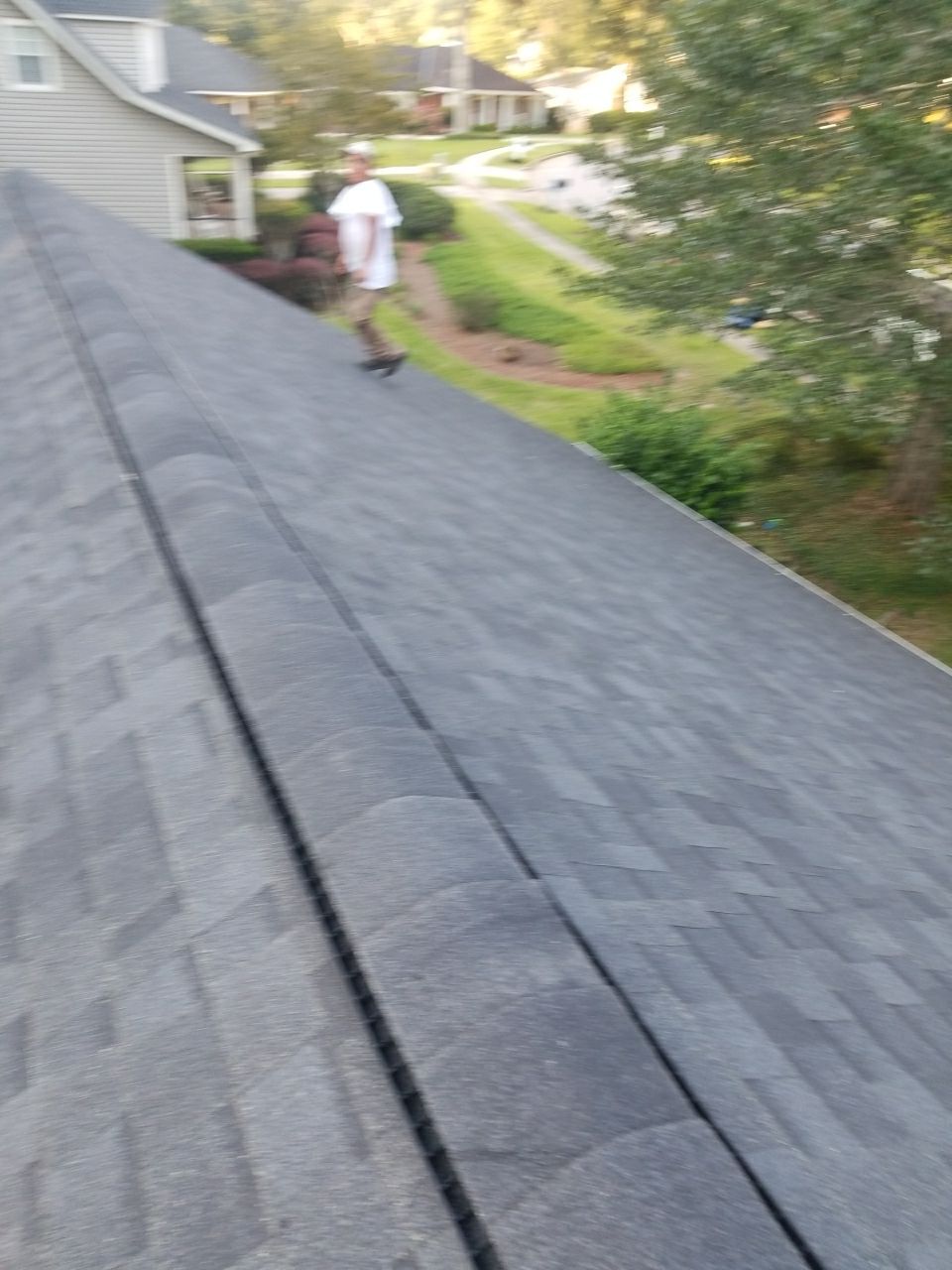Residential Roofing Installation using Roof Replacement by American Roofing & Construction LLC