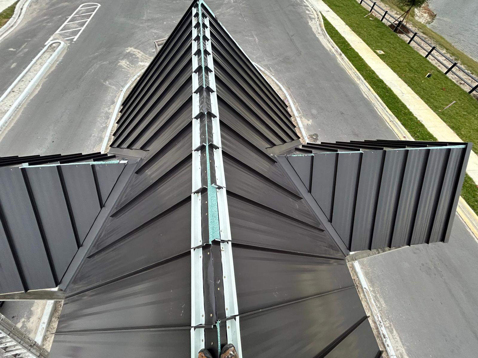 24ga 1.5" Mechanical Seam Dark Bronze by Total Roofing System The Metal Roof Experts