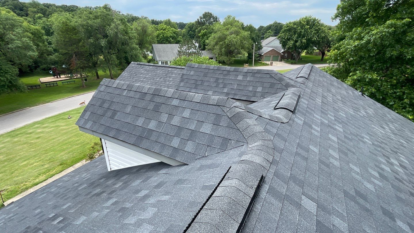 Residential Roof + Gutters & Downspouts & Gutter Guards Install  by Titan Commercial & Residential Roofing 