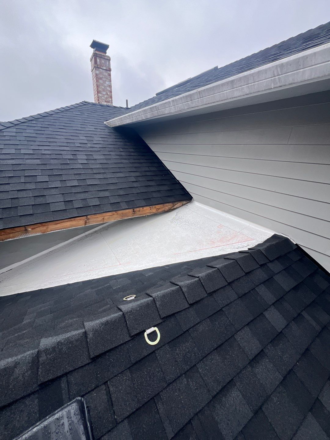 Residential Roofing Installation using IKO Dynasty (Color: Granite Black) by Orezona Building & Roofing Company, Inc.