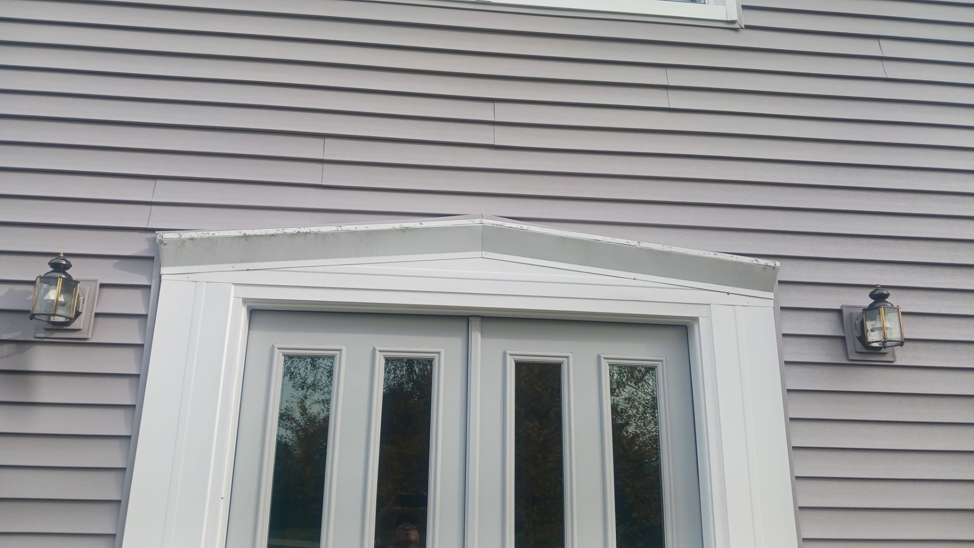 New Siding and Windows by NextWave Construction