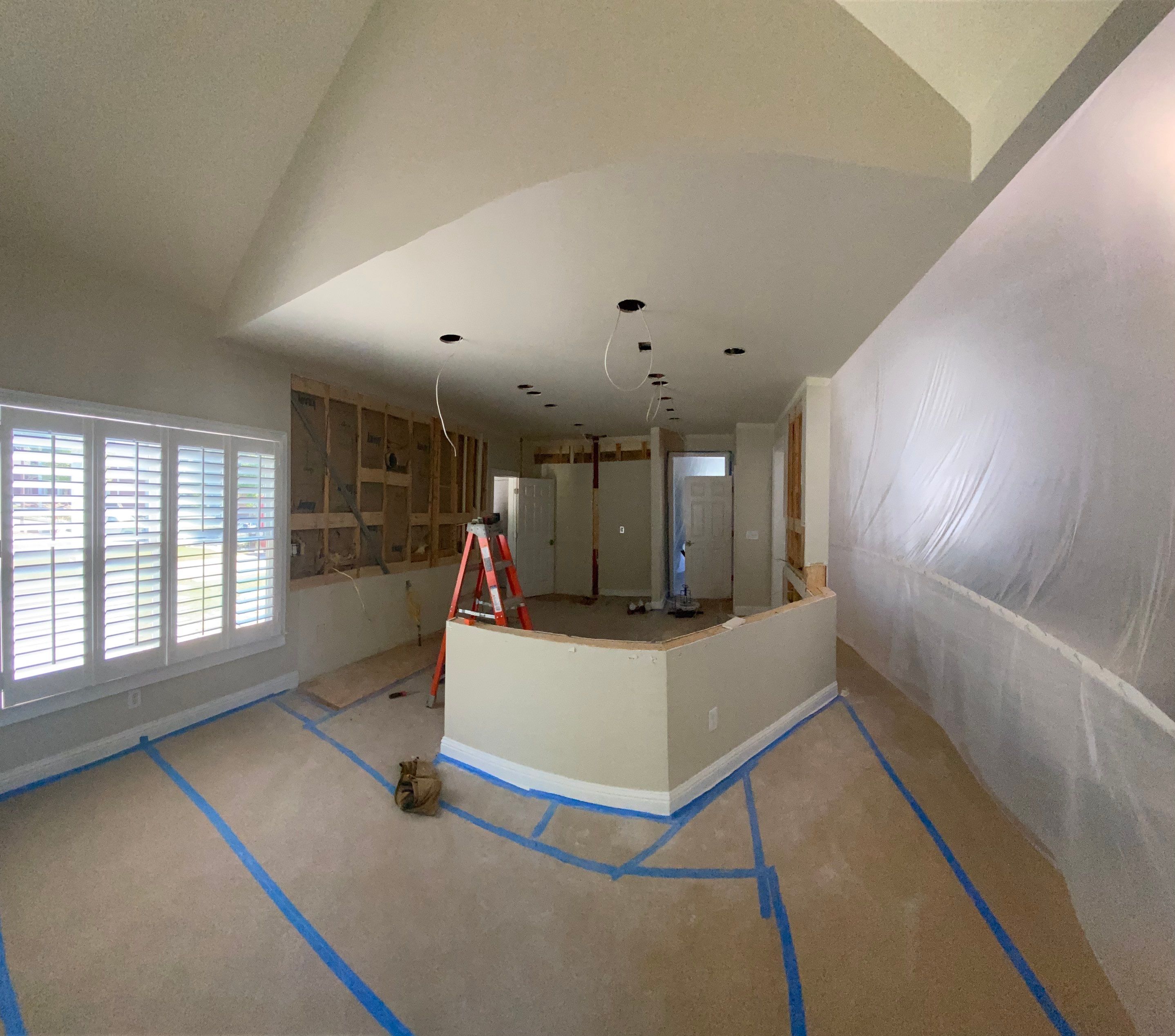 Modern Kitchen Remodeling with Quartz Island and Custom Vent Hood in Woodstock by Swift Home Renovations