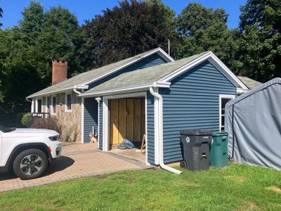 Siding using Cert Monogram D/4 x 12'6" clapboard, Pacific Blue