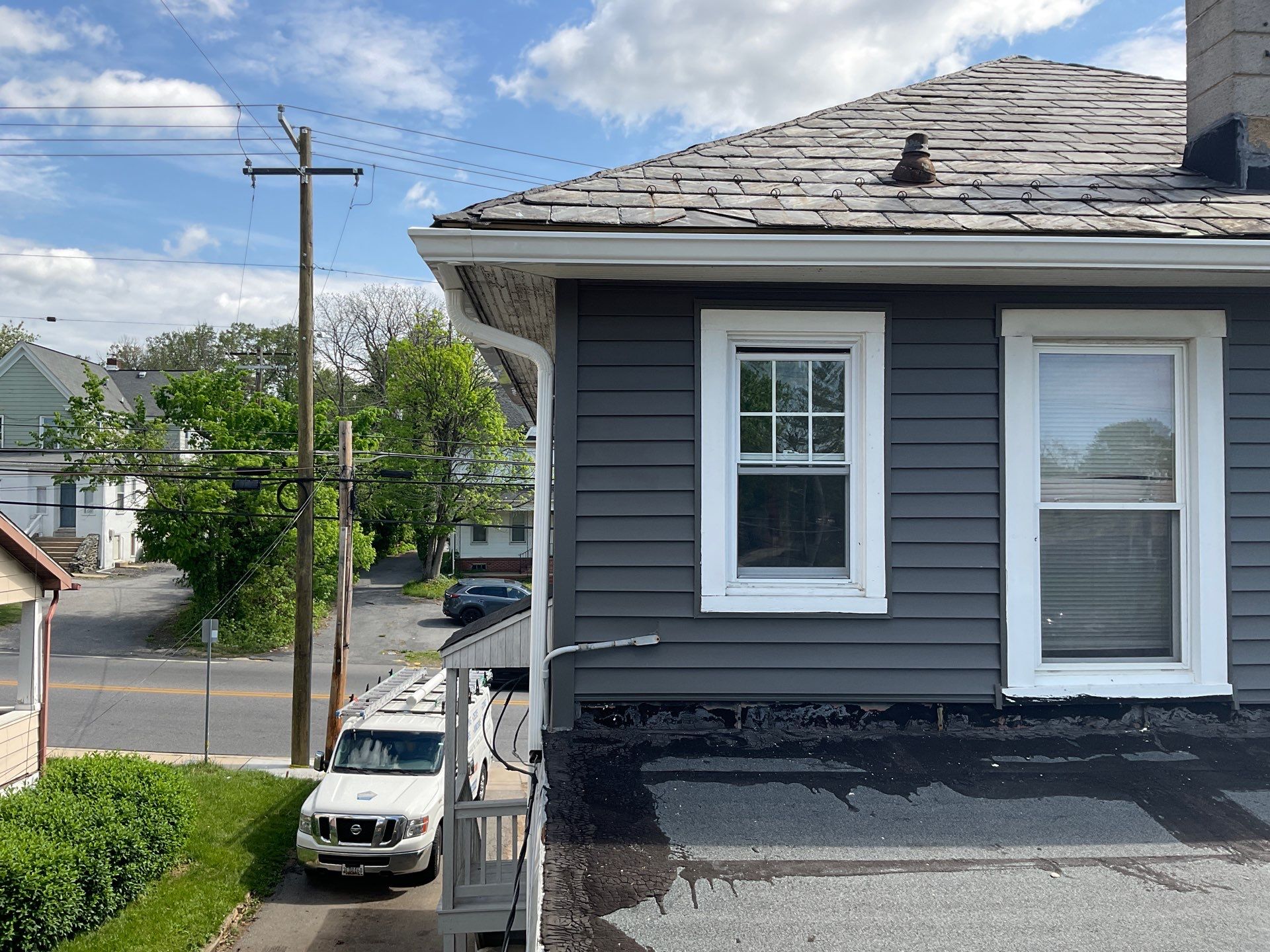 New siding & New Gutters by Alpha Design Services