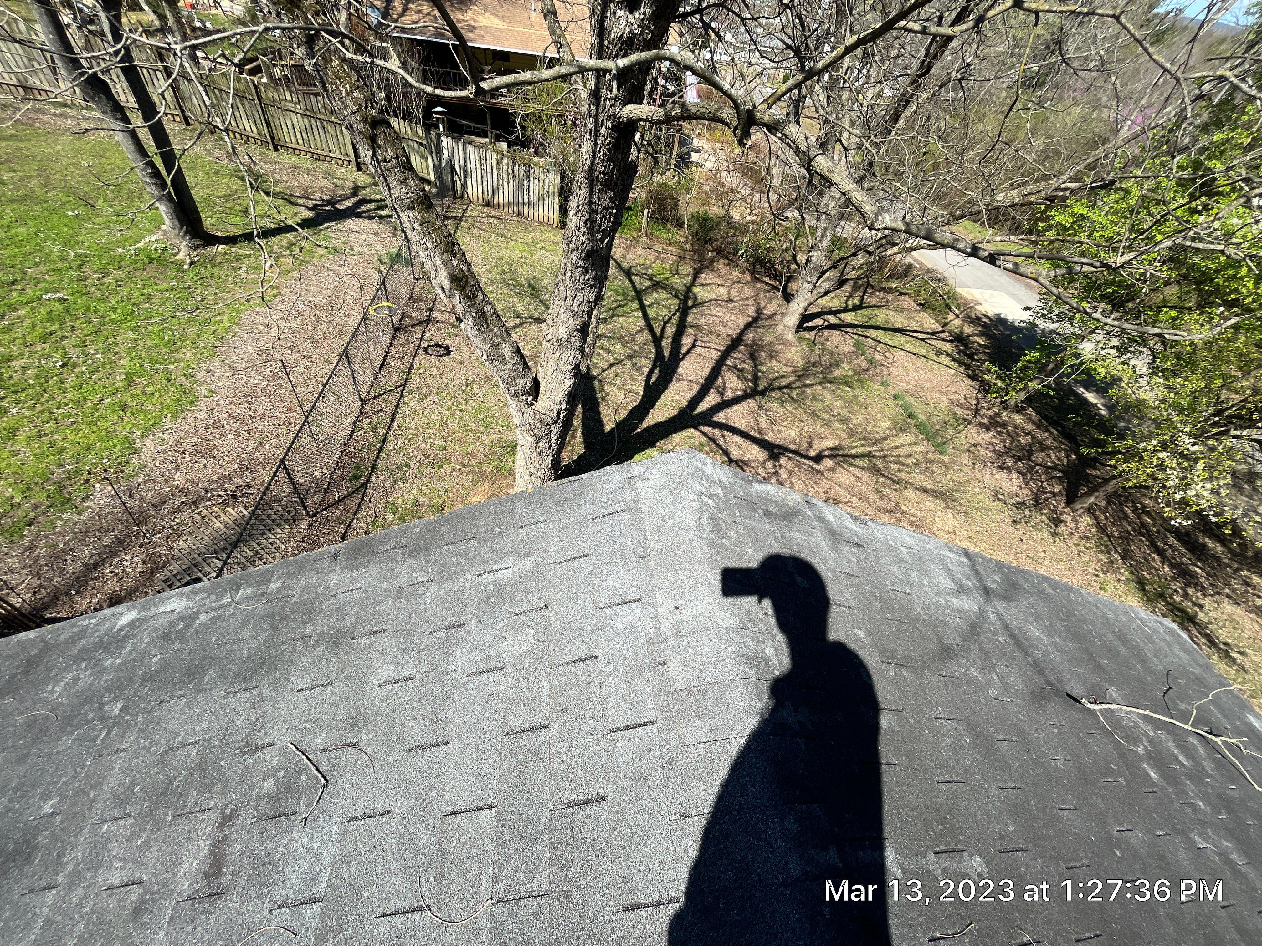 Residential Roofing Installation using 26 Gauge Colored Panels by Hostetler Roofing