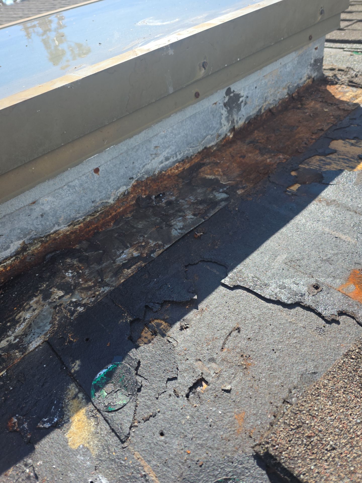 REPLACE NON APPROVED SKYLIGHT ALONG WITH CLOGED GUTTER by Morton Roofing, Inc.