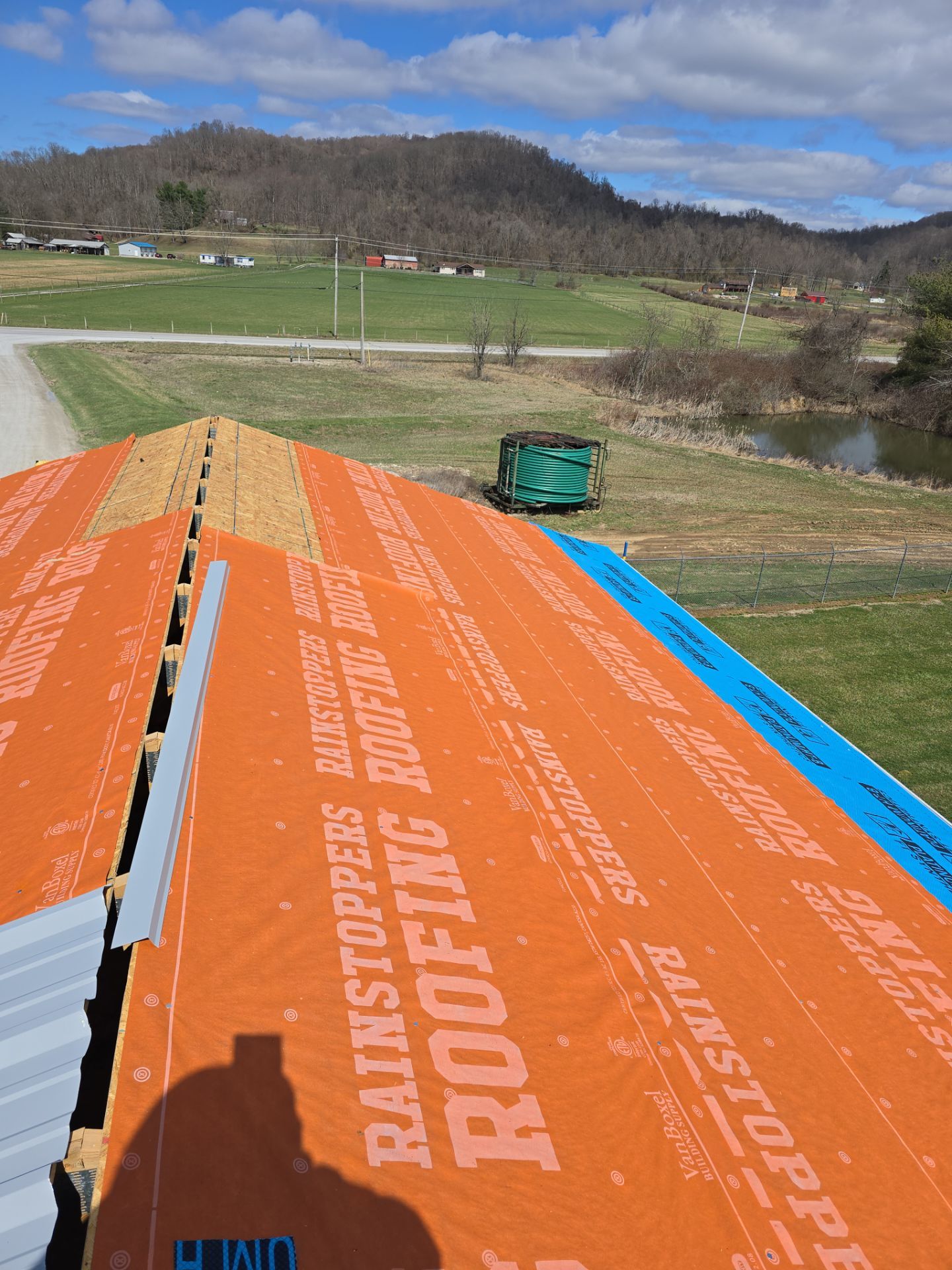 Commercial Roofing Installation using Metal by Rainstoppers Roofing
