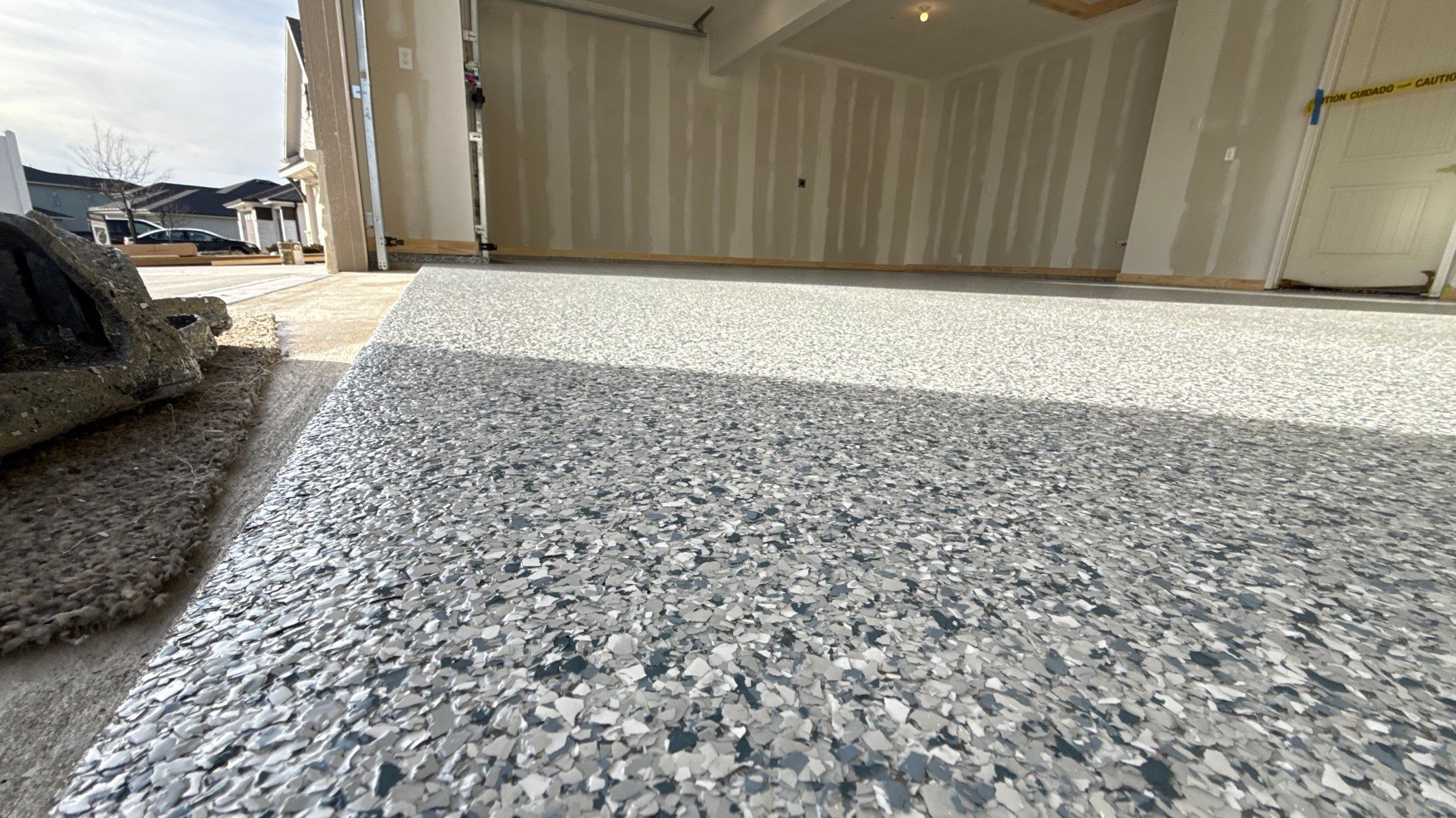 New floor for Dusty Rhodes homes in Raymore! by Banner Garage