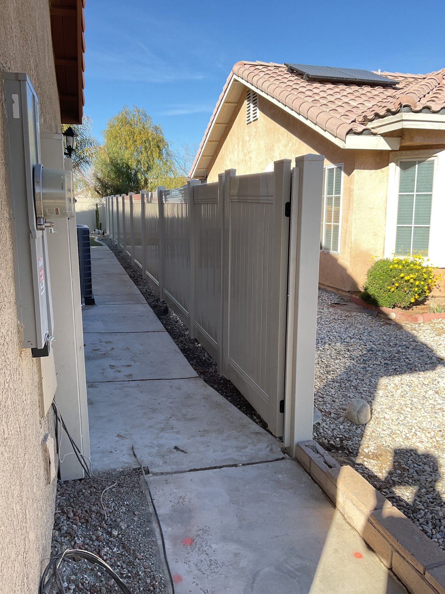 Beautiful vinyl fence installation by Fence Guys Inc.