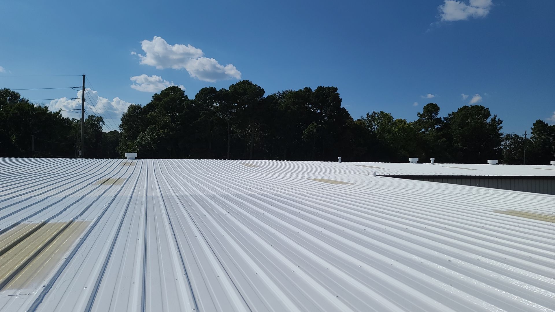 Commercial Metal Restoration System using Aldocoat Coatings by Hostetler Roofing