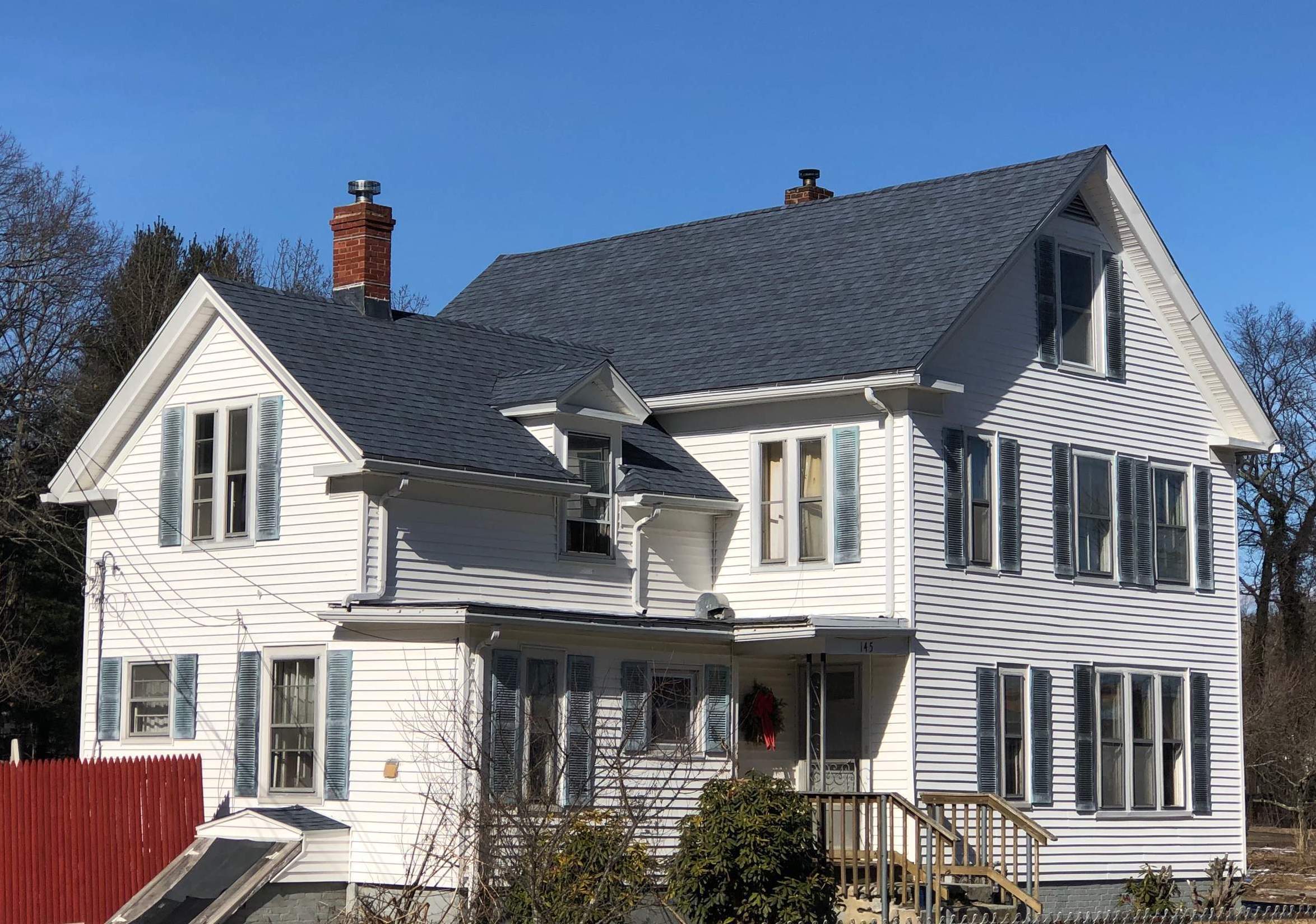 Coastal Blue Roofs by Pinnacle Roofing & Skylights