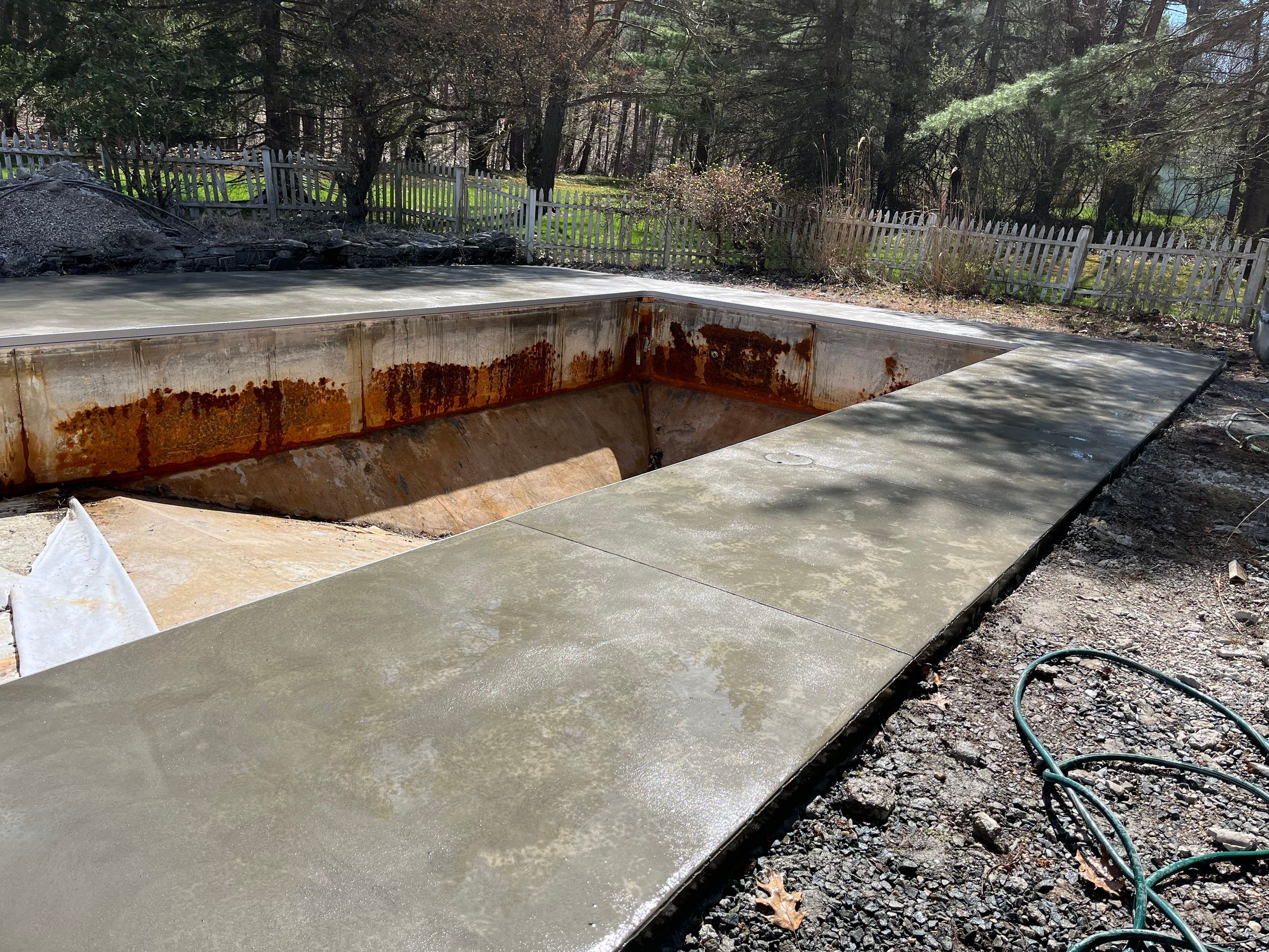 In-Ground Swimming Pool Renovation and Concrete Decking in Old Chatham by Cypress Pools and Spas