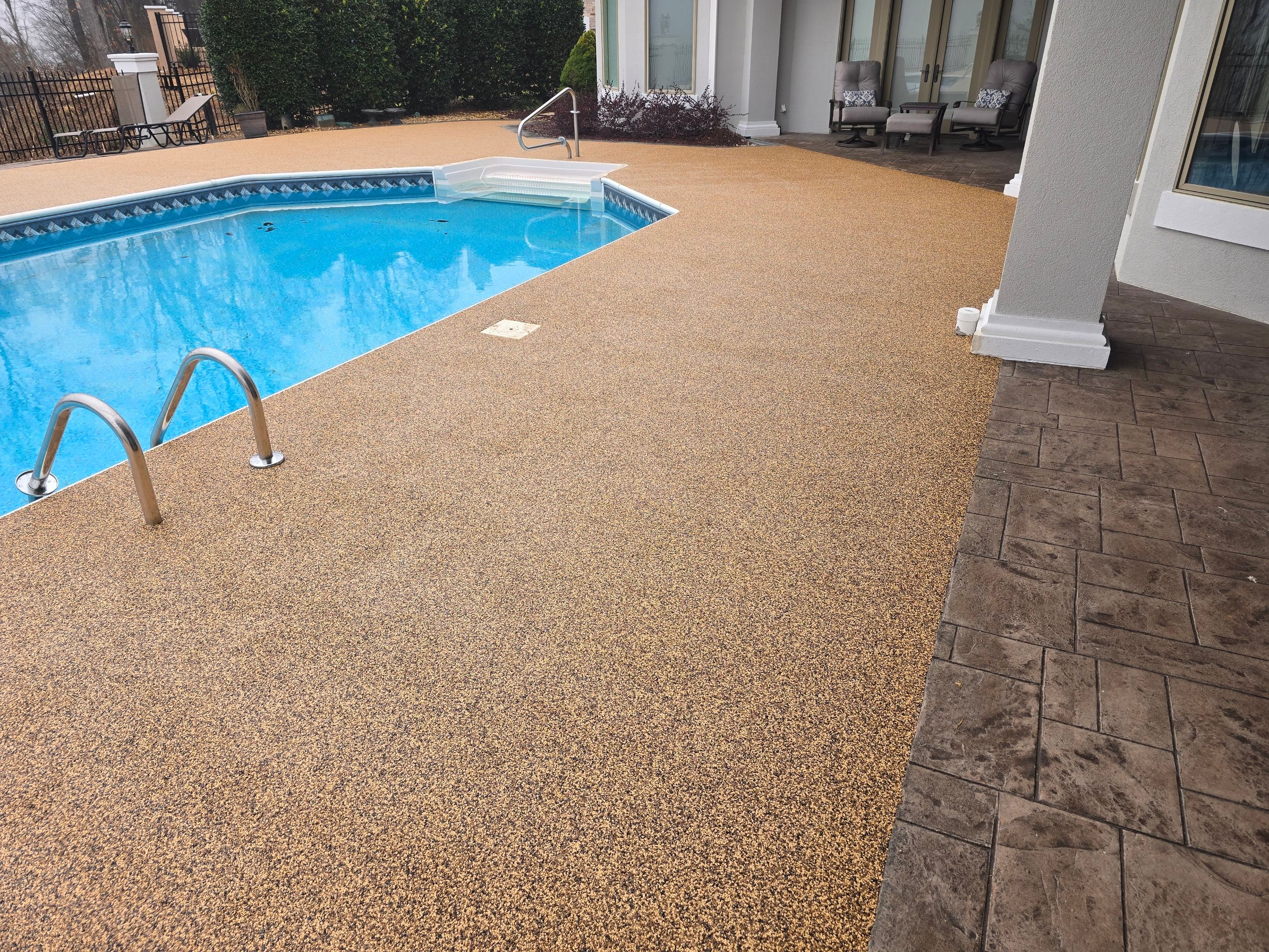 Pool Deck Using Brownstone by Elite Floor Solutions