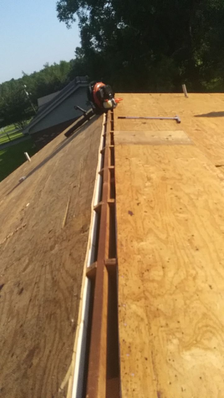 Residential Roofing Installation using Roof Replacement by American Roofing & Construction LLC