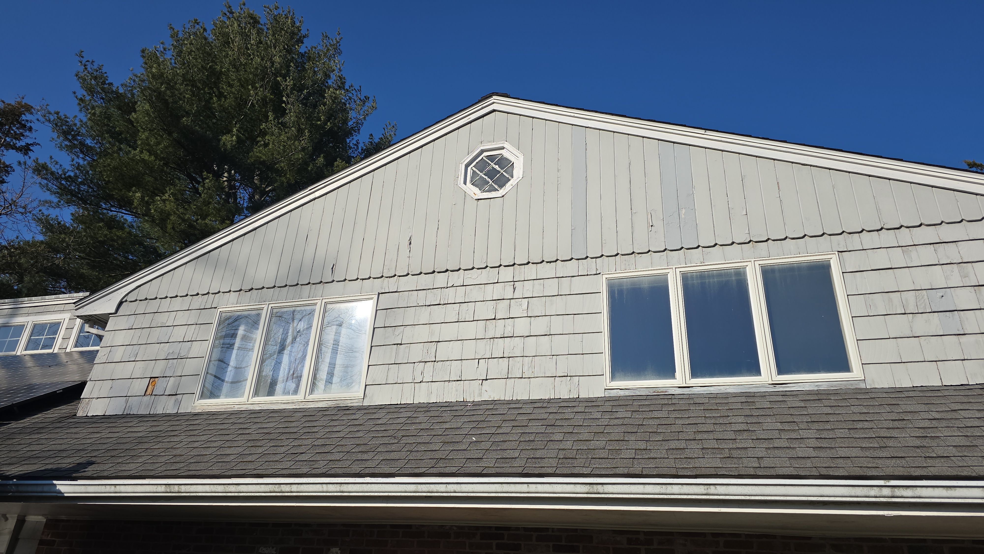 James Hardie clpaboards and Board and Batten style in Natick, MA by UBrothers Construction