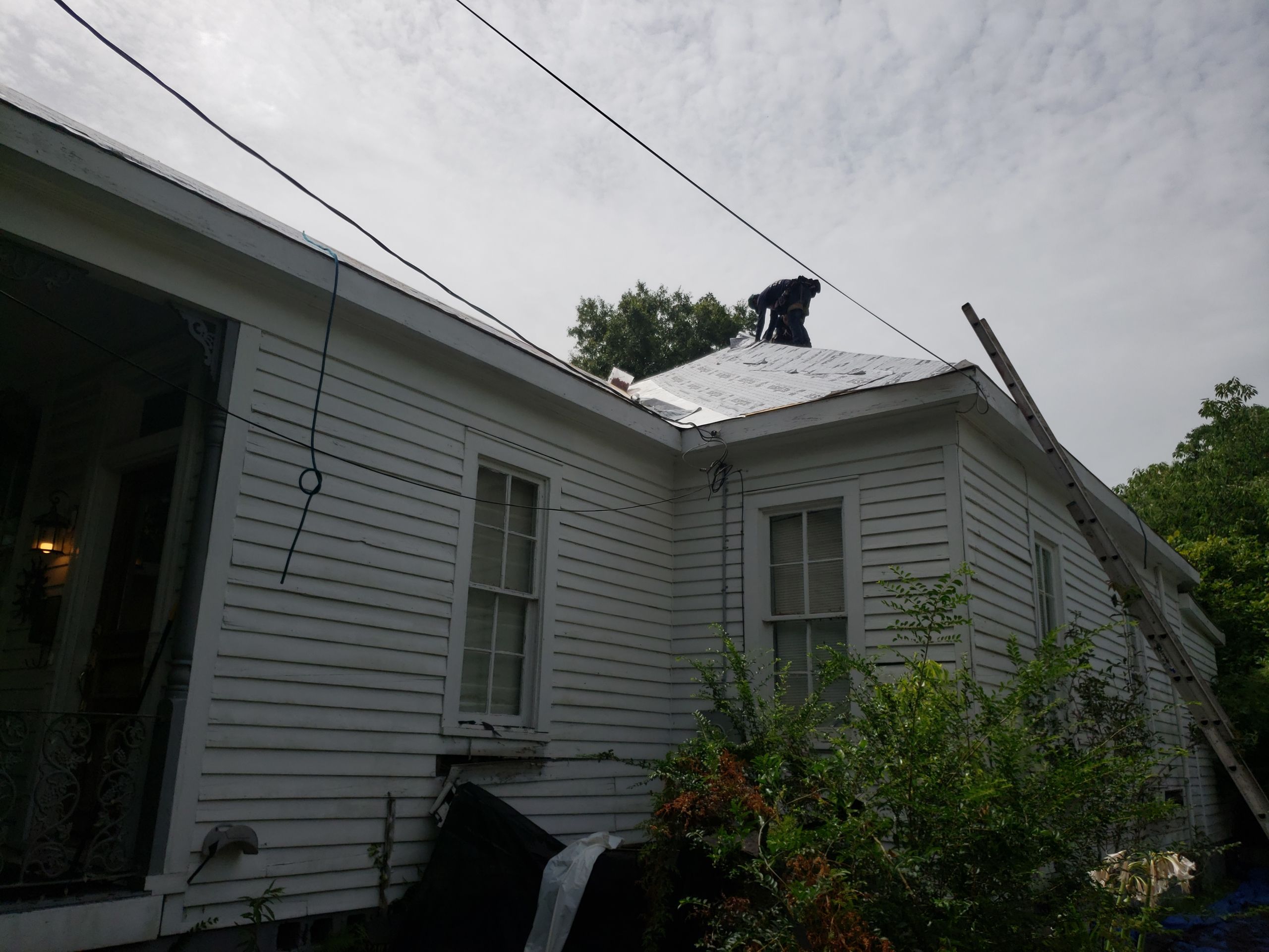 Residential Roofing Installation using Roof Replacement by American Roofing & Construction LLC